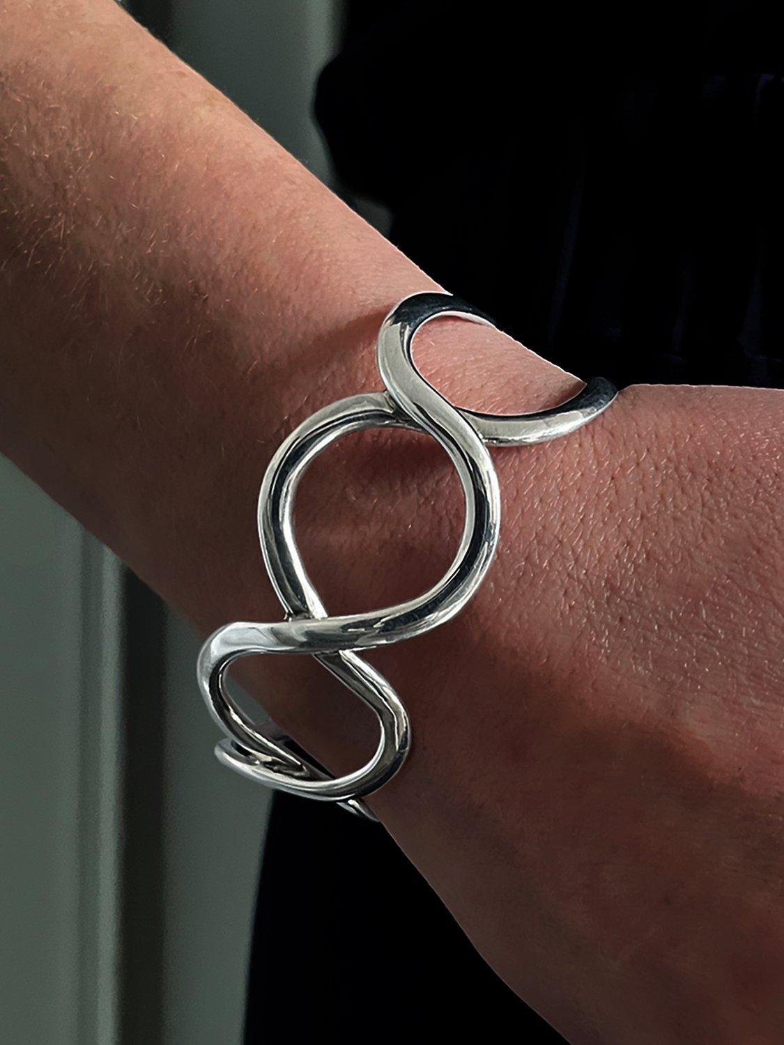 Product image 4 of 6, which shows Nina B Open Loops Sterling Silver Cuff Bangle, Silver