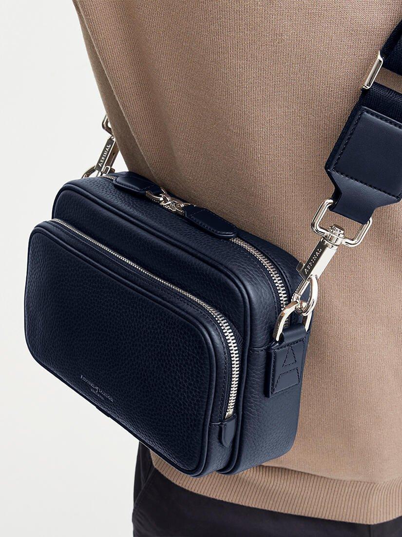 Product image 7 of 7, which shows Aspinal of London Reporter East West Pebble Leather Messenger Bag, Navy
