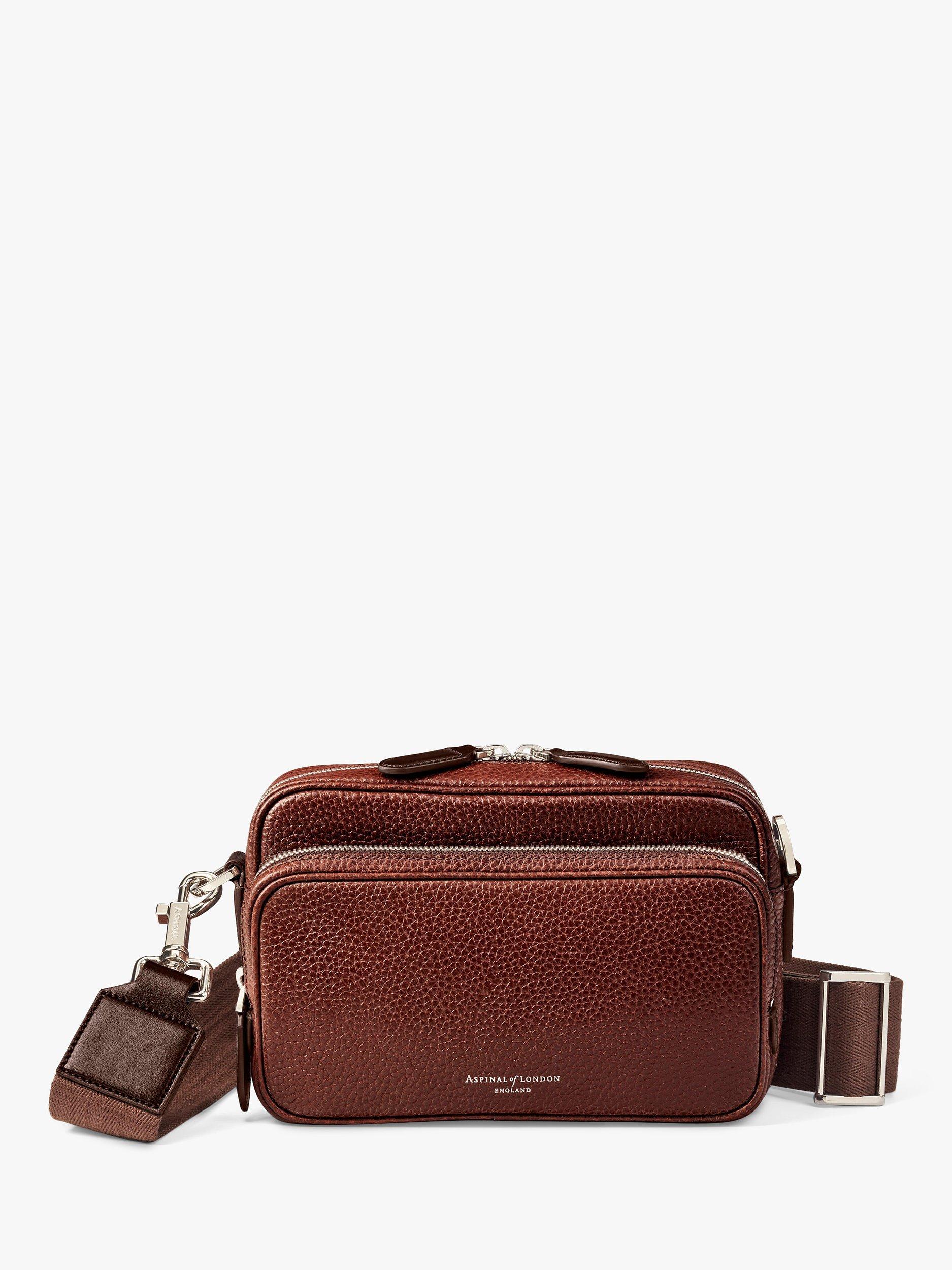 Product image 1 of 7, which shows Aspinal of London Reporter East West Pebble Leather Messenger Bag, Tobacco