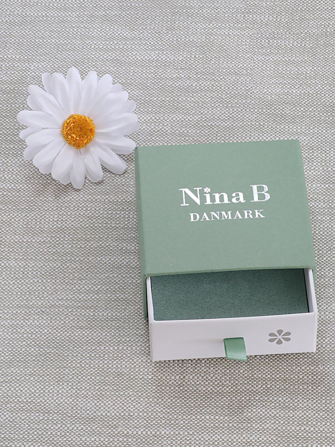 Product image 4 of 4, which shows Nina B Polished Lily Pendant Necklace, Silver