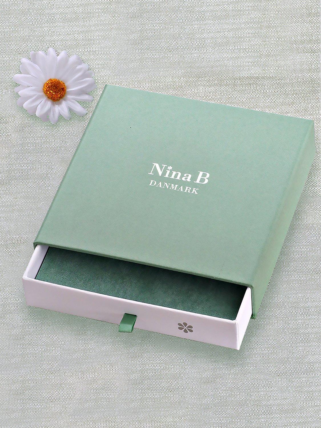 Product image 4 of 4, which shows Nina B Polished Lily Collar Necklace, Silver