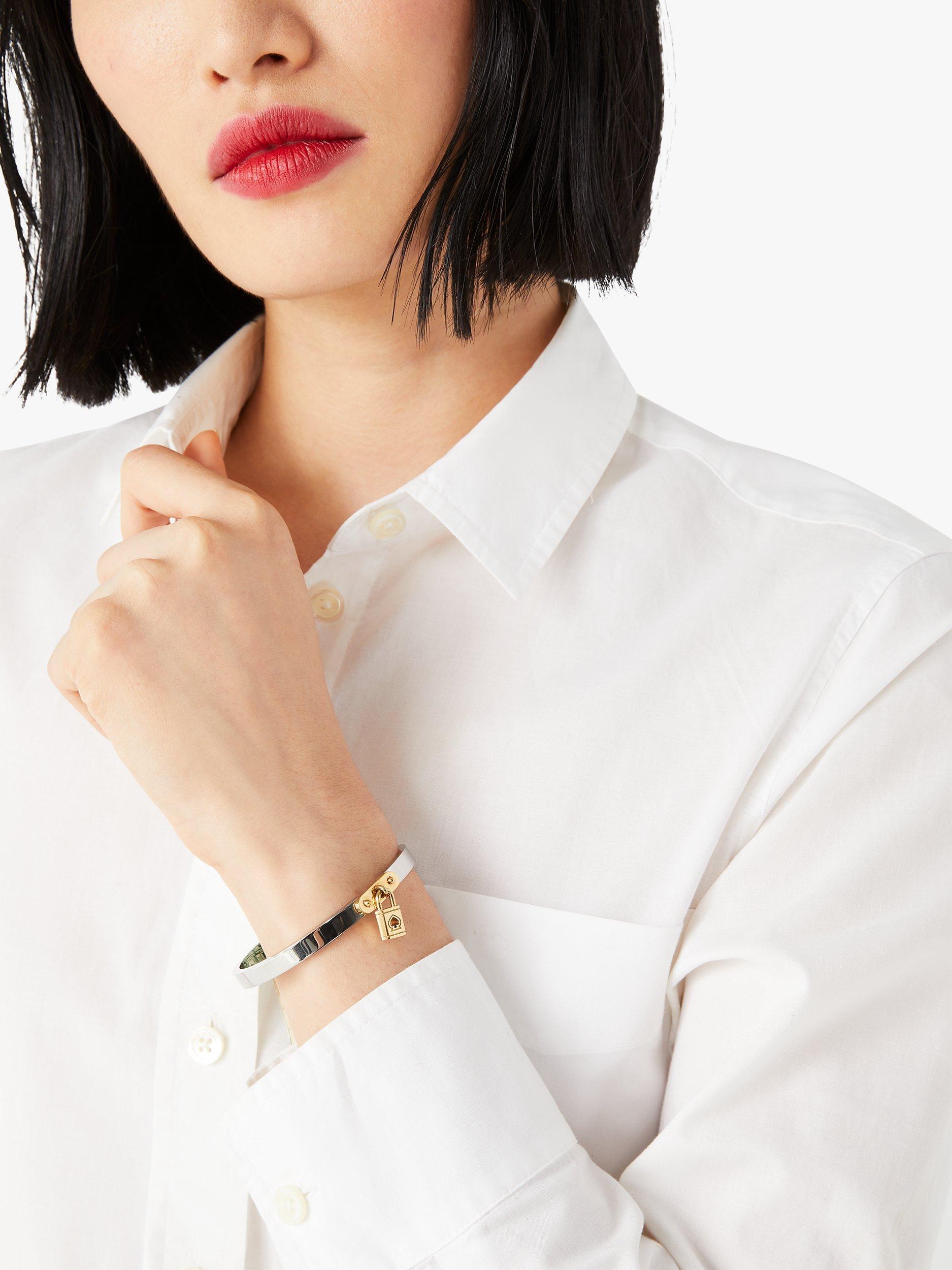 Product image 2 of 3, which shows kate spade new york Lock Charm Bangle, Silver