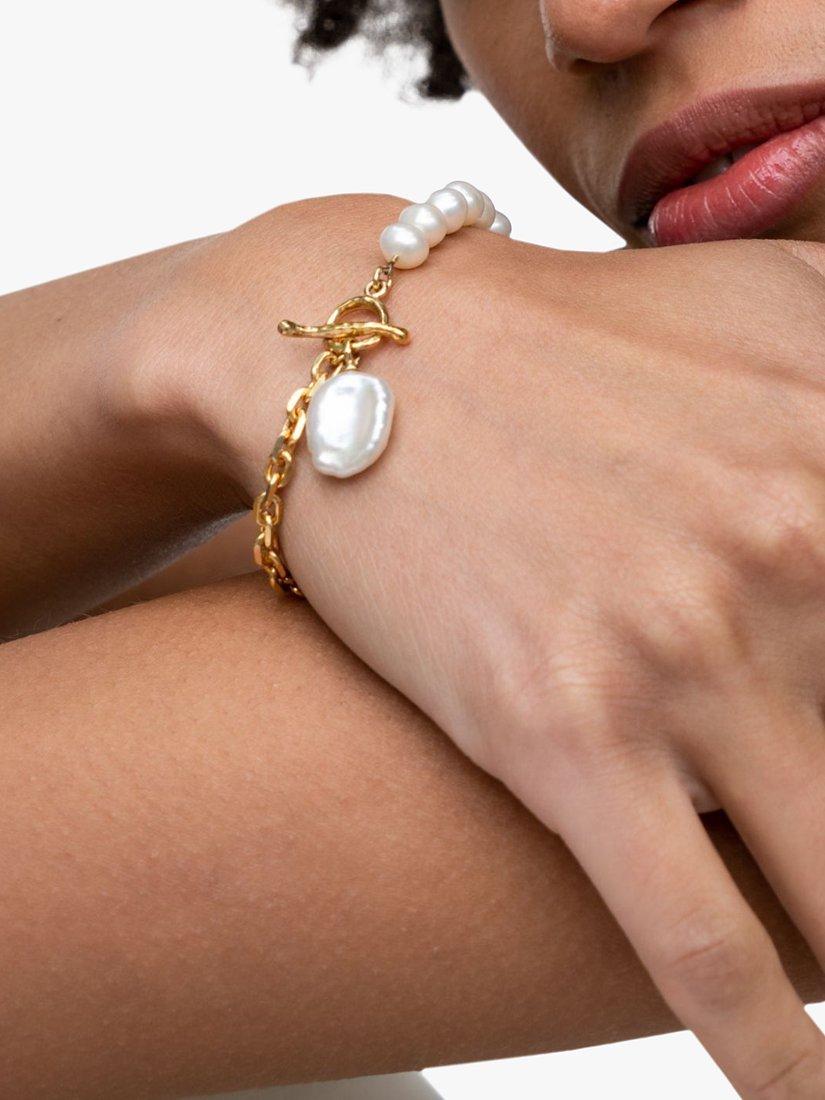 Product image 2 of 6, which shows Dower & Hall Baroque Pearl & Chain Bracelet, Gold/White