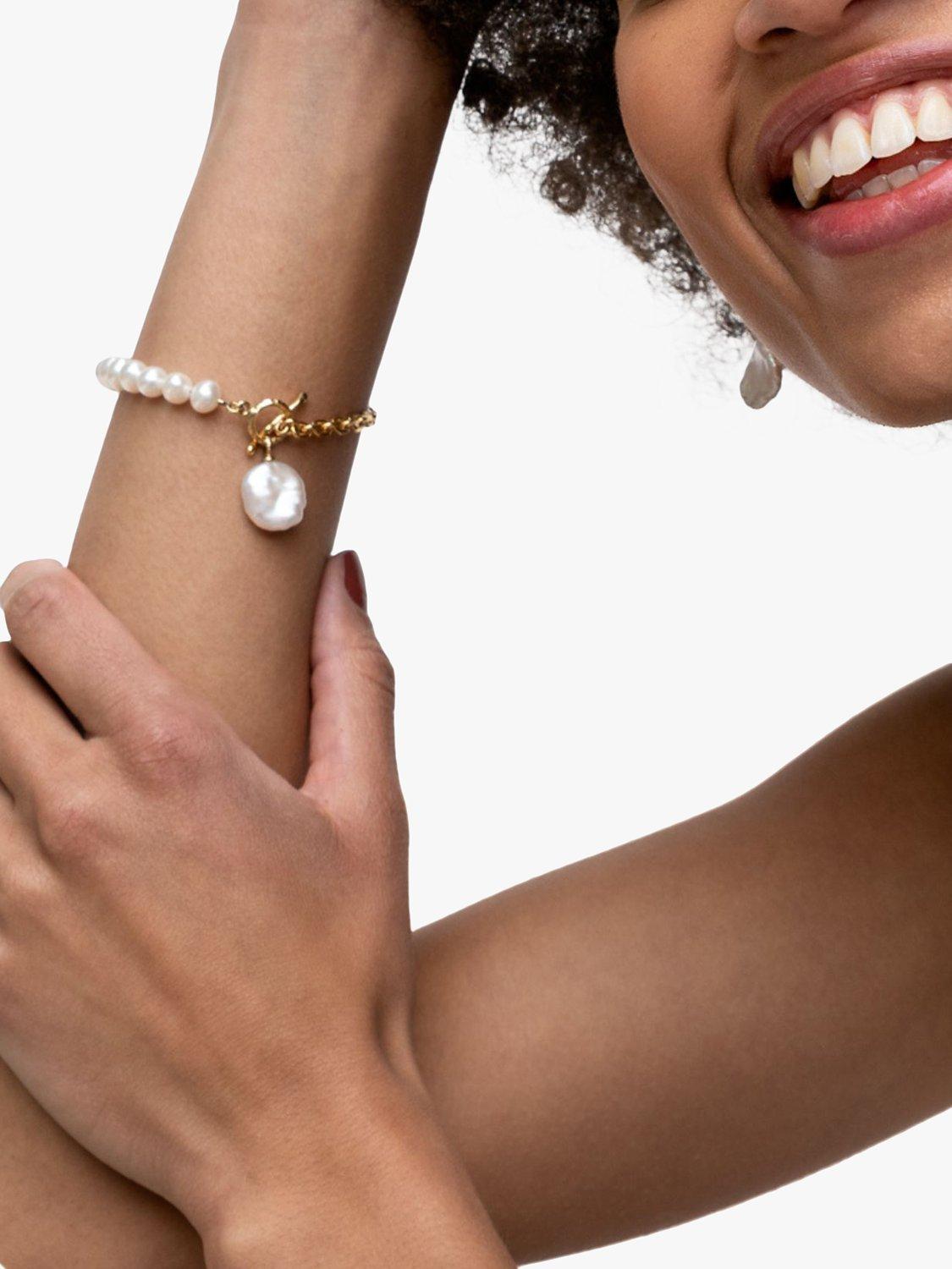 Product image 3 of 6, which shows Dower & Hall Baroque Pearl & Chain Bracelet, Gold/White