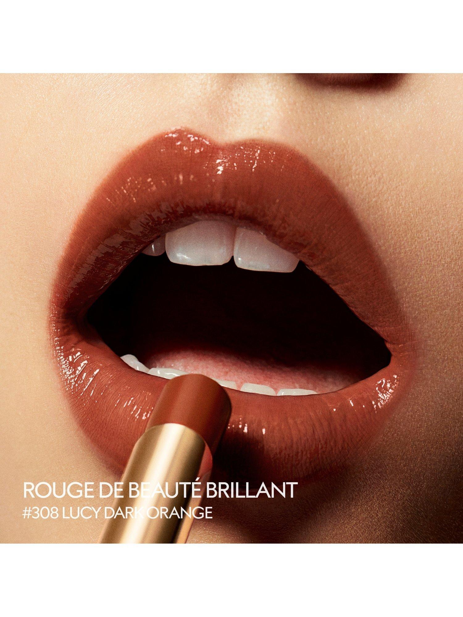 Product image 6 of 9, which shows Gucci Rouge de Beauté Brillant High-Shine Lipstick, 308 Lucy Dark Orange