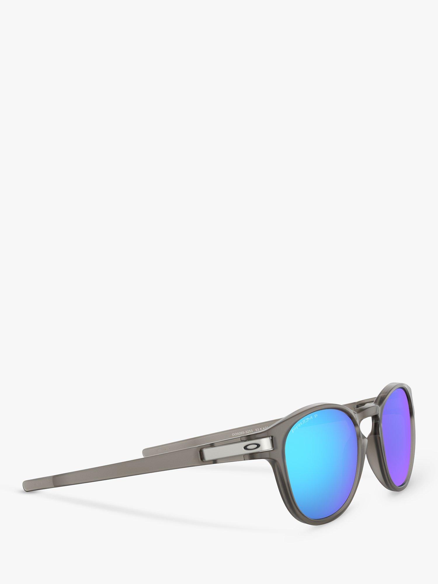 Product image 11 of 11, which shows Oakley OO9265 Men's Latch Prizm Polarised Oval Sunglasses, Matte Grey Ink/Mirror Blue