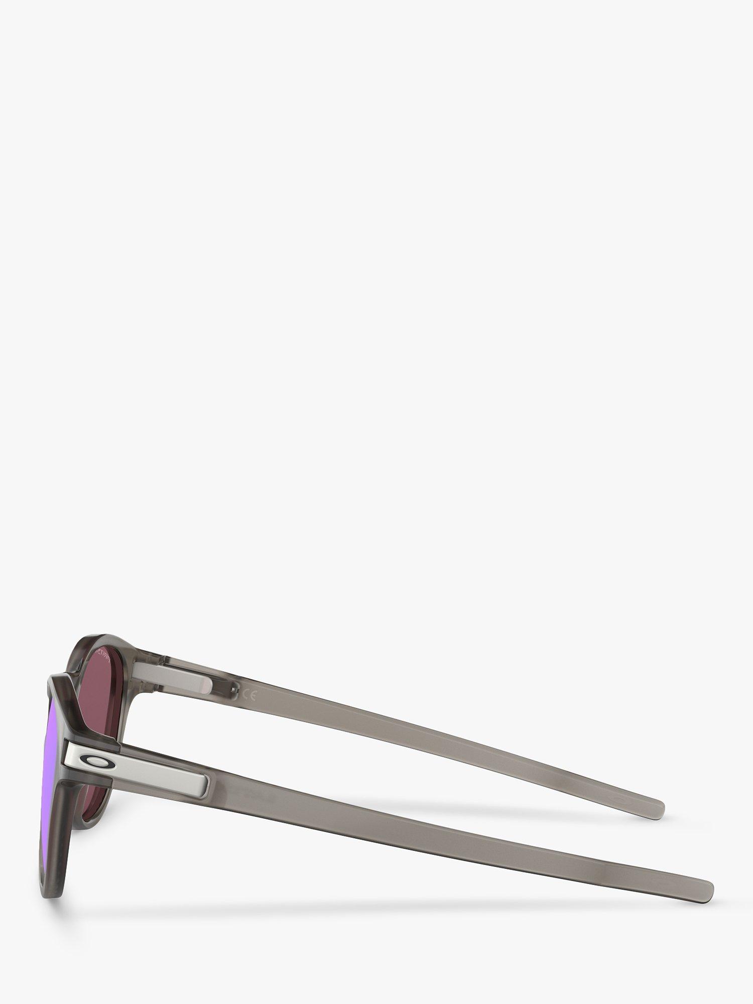 Product image 4 of 11, which shows Oakley OO9265 Men's Latch Prizm Polarised Oval Sunglasses, Matte Grey Ink/Mirror Blue