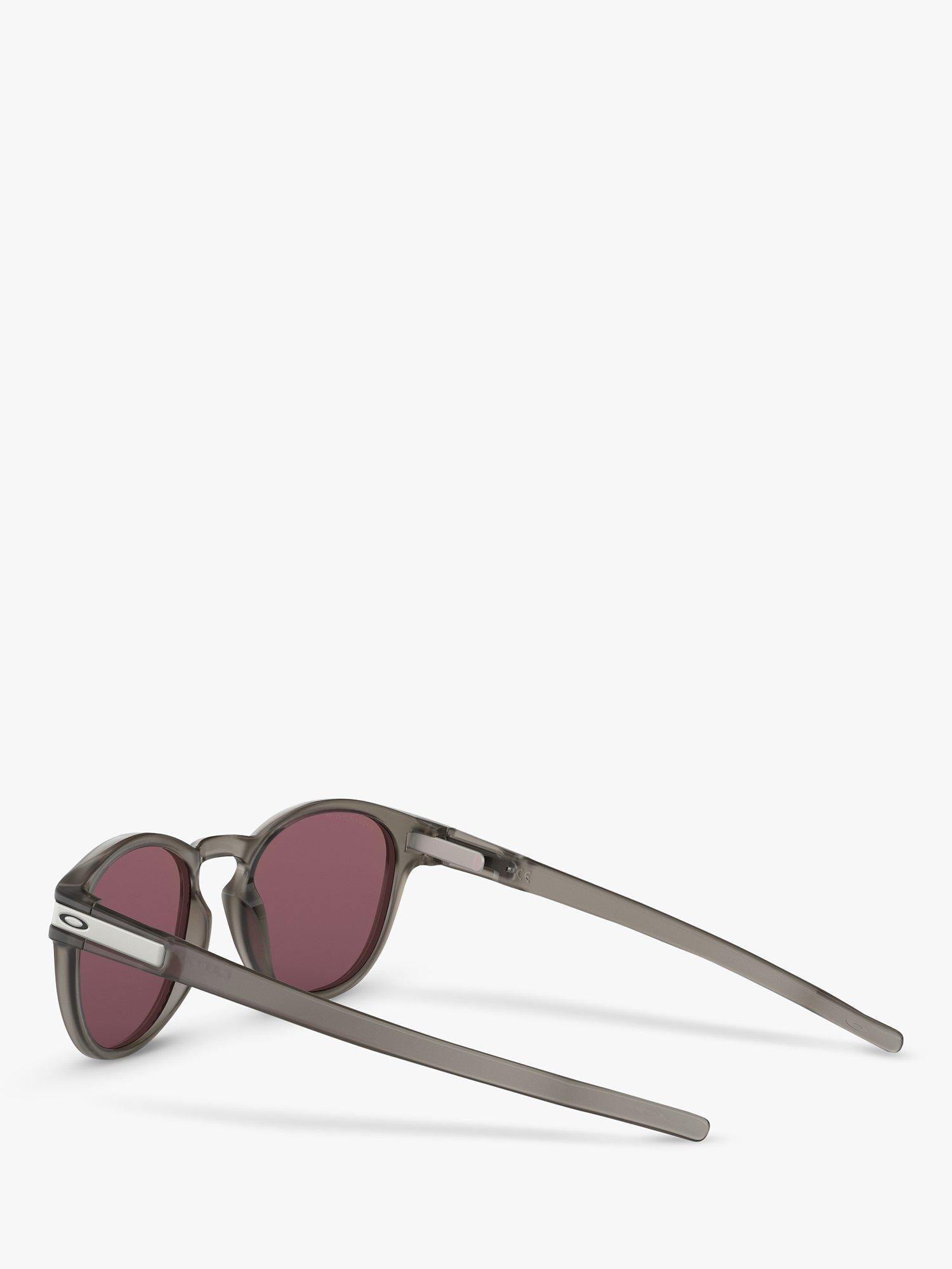 Product image 5 of 11, which shows Oakley OO9265 Men's Latch Prizm Polarised Oval Sunglasses, Matte Grey Ink/Mirror Blue