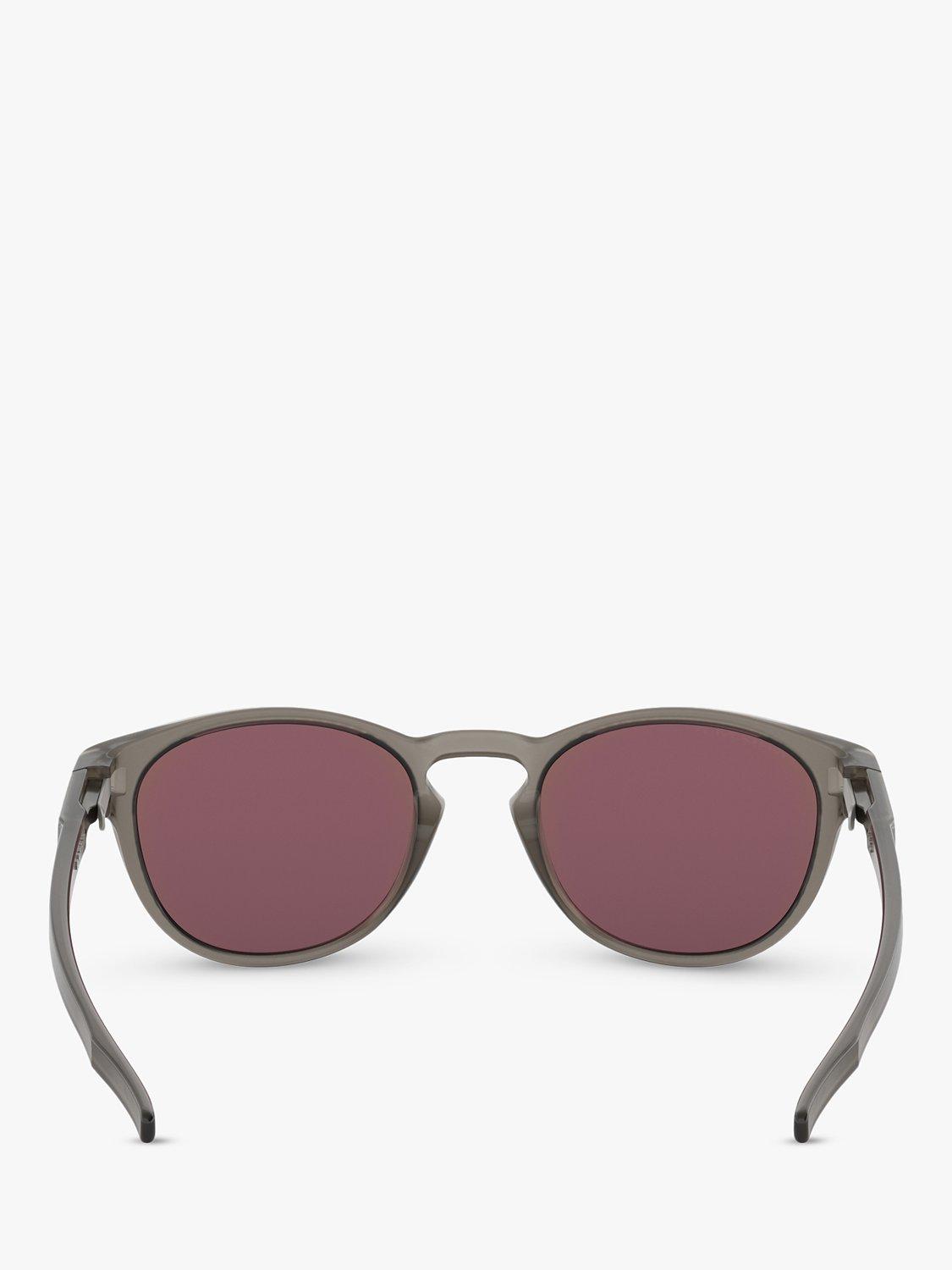 Product image 7 of 11, which shows Oakley OO9265 Men's Latch Prizm Polarised Oval Sunglasses, Matte Grey Ink/Mirror Blue