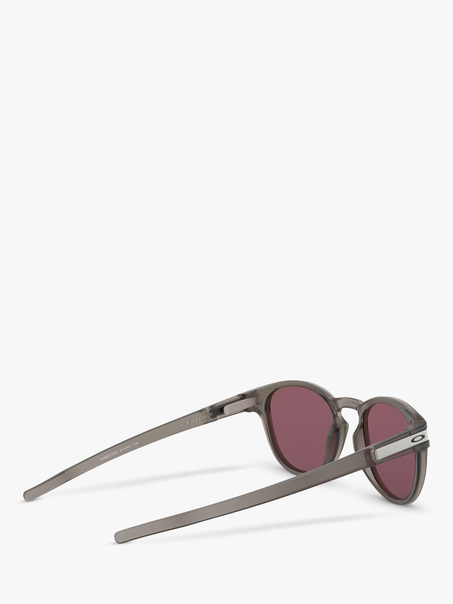 Product image 9 of 11, which shows Oakley OO9265 Men's Latch Prizm Polarised Oval Sunglasses, Matte Grey Ink/Mirror Blue