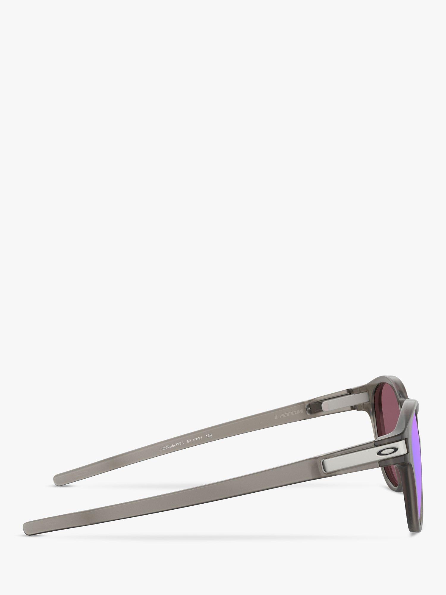 Product image 10 of 11, which shows Oakley OO9265 Men's Latch Prizm Polarised Oval Sunglasses, Matte Grey Ink/Mirror Blue