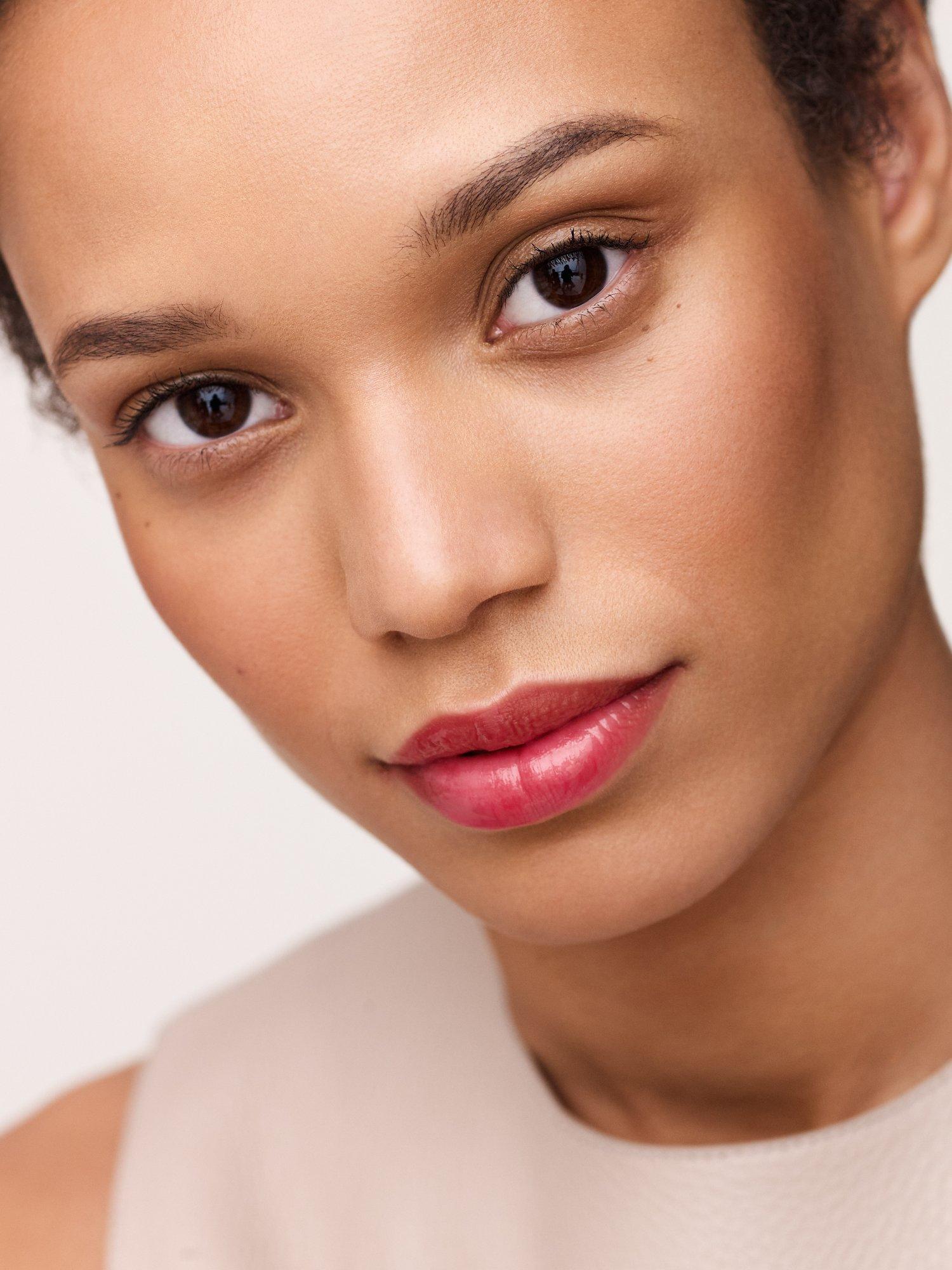 Product image 4 of 10, which shows Hermès Hermèsistible Infused Care Oil Lip Gloss, 04 Rouge Amarelle