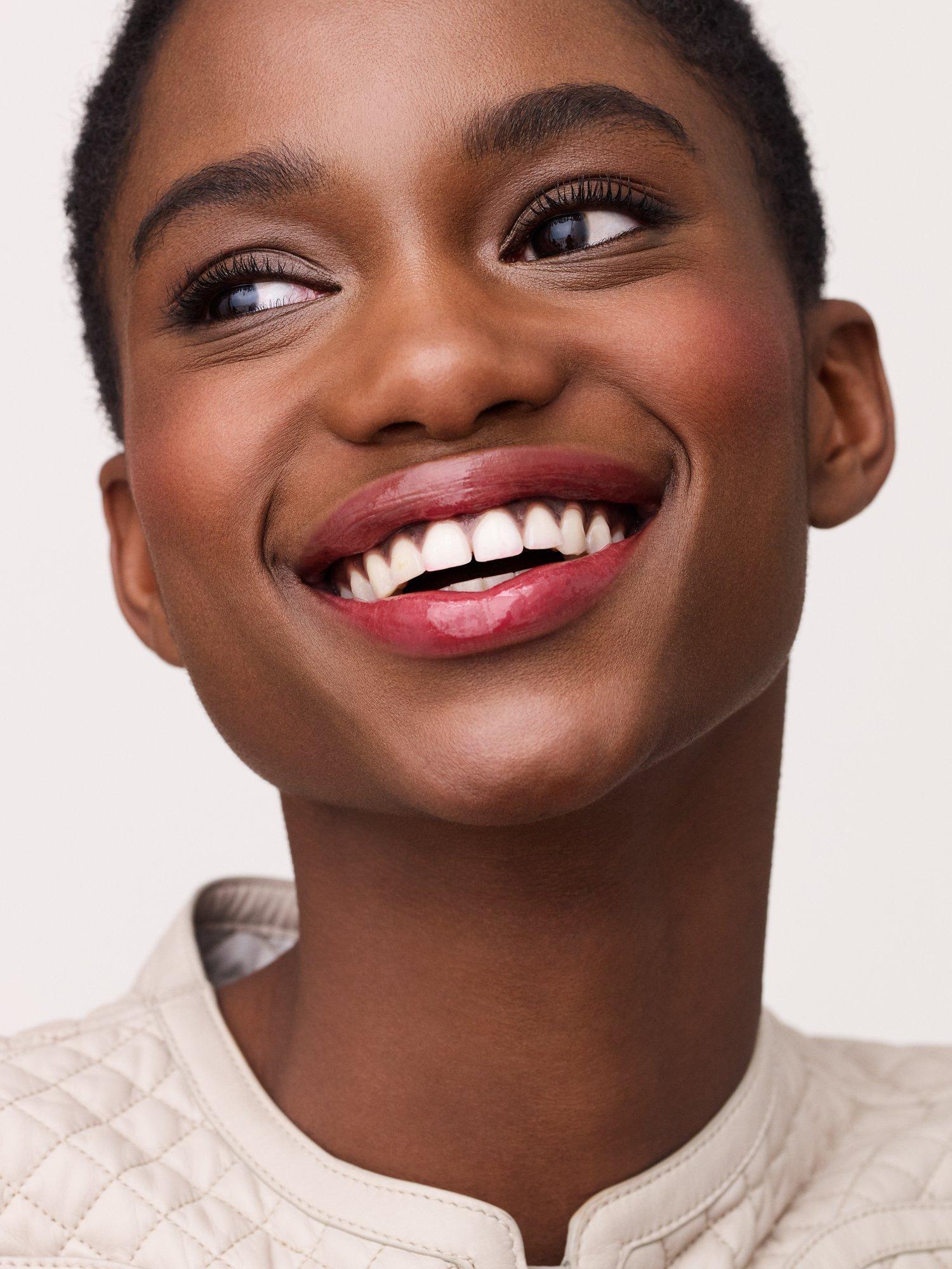 Product image 5 of 10, which shows Hermès Hermèsistible Infused Care Oil Lip Gloss, 04 Rouge Amarelle