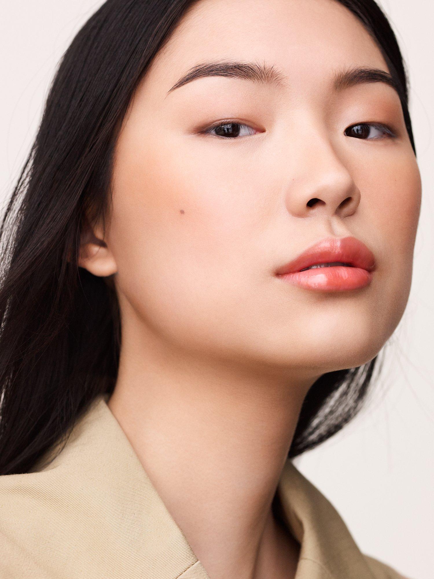 Product image 2 of 10, which shows Hermès Hermèsistible Infused Care Oil Lip Gloss, 02 Corail Bigarade