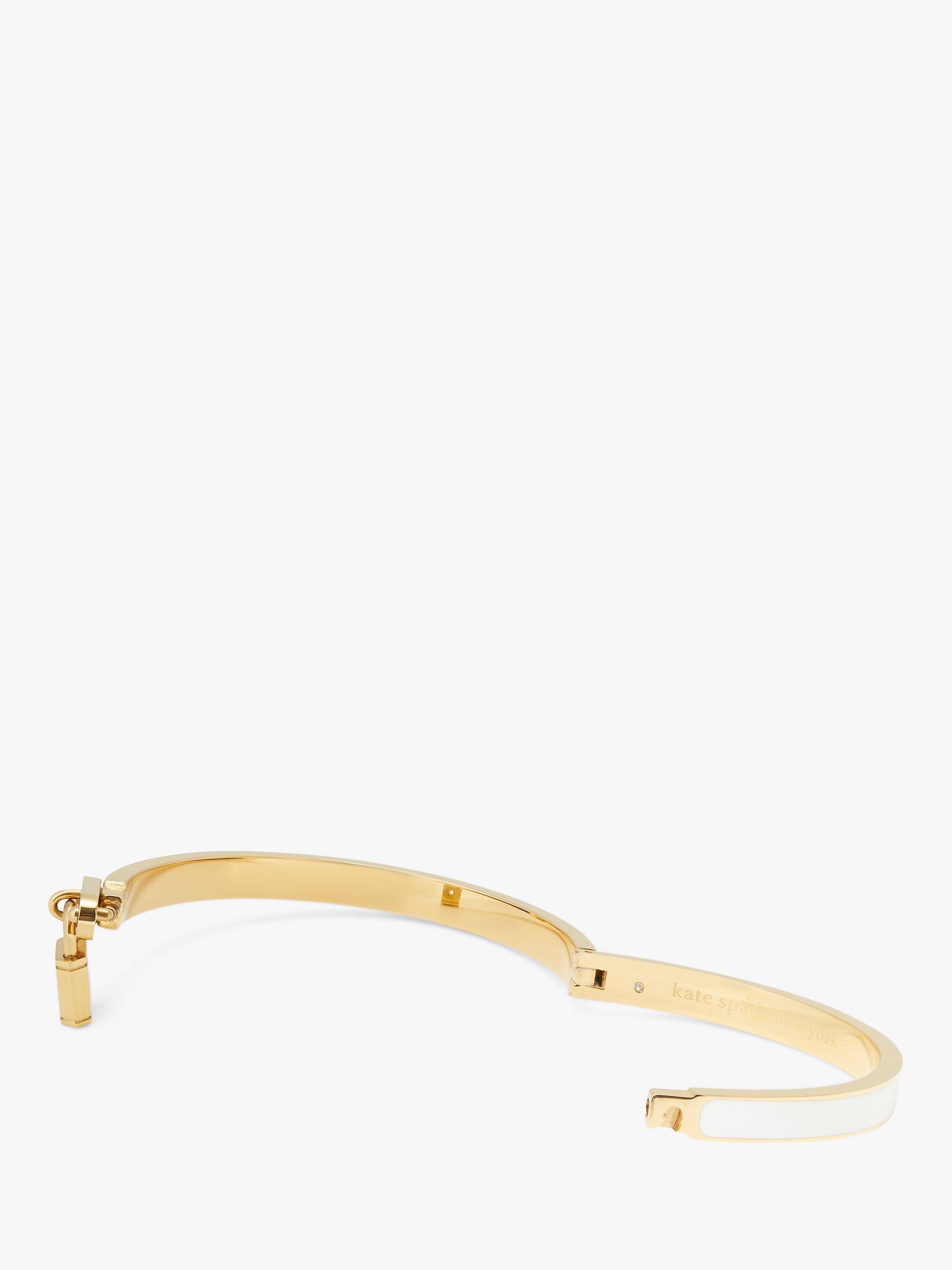 Product image 2 of 2, which shows kate spade new york Resin Lock Charm Bangle, Gold/White