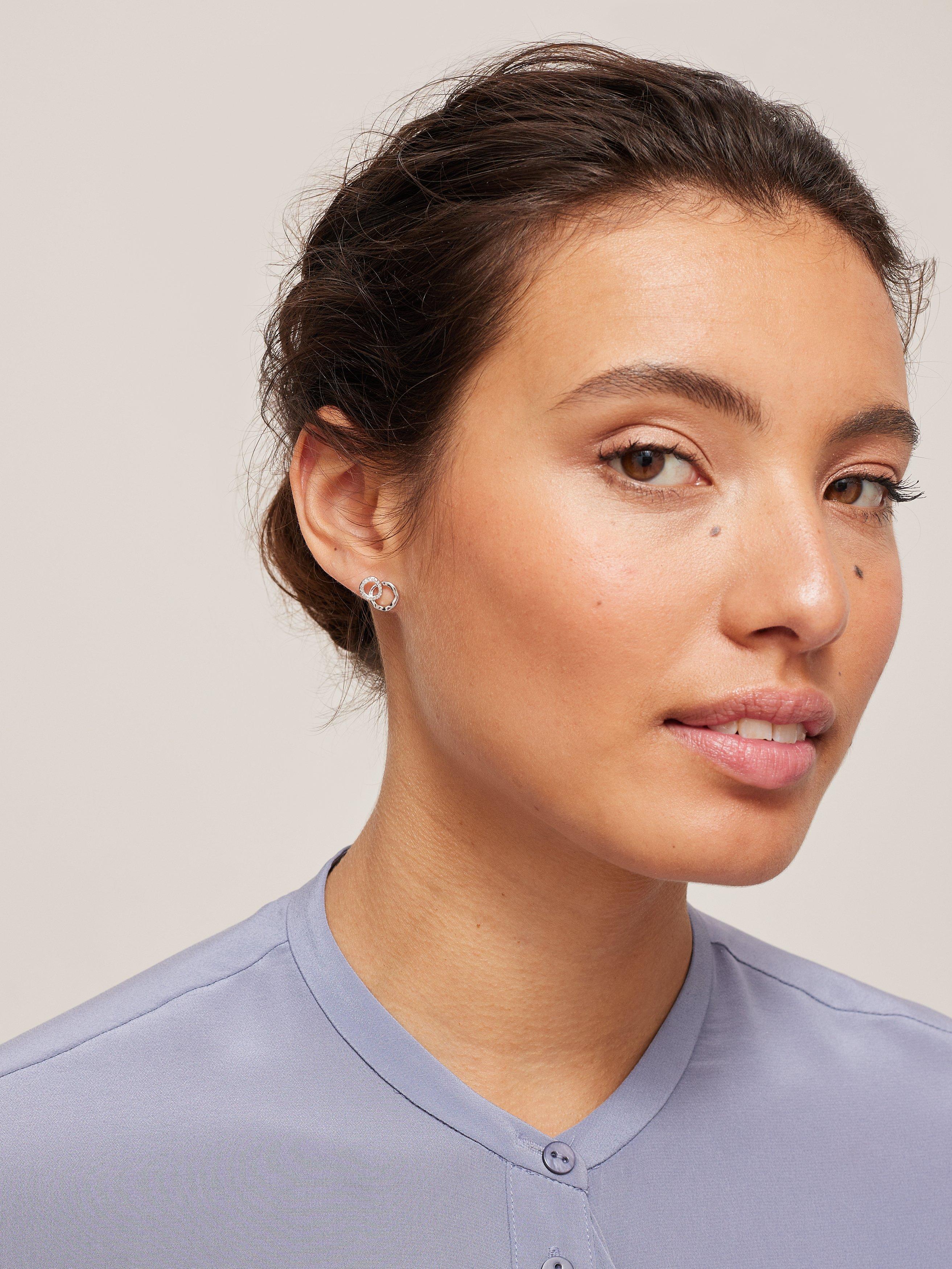 Product image 2 of 3, which shows John Lewis Mini Interlocking Diamond Stud Earrings, Silver
