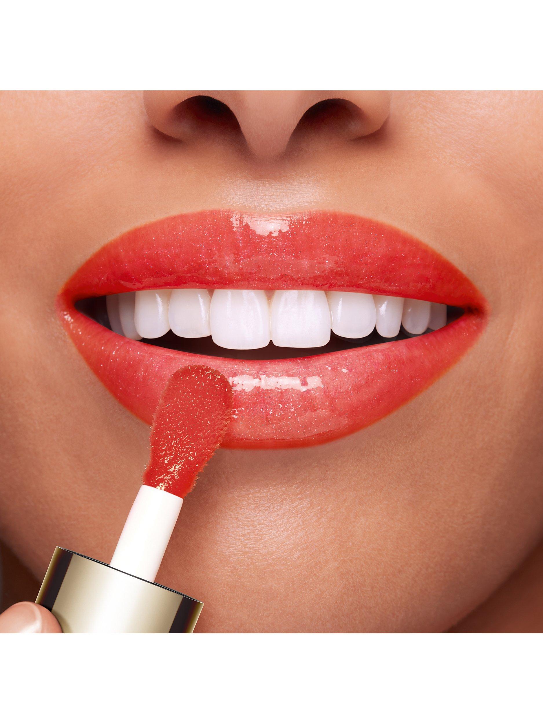 Product image 5 of 6, which shows Clarins Lip Comfort Oil, 08 Strawberry
