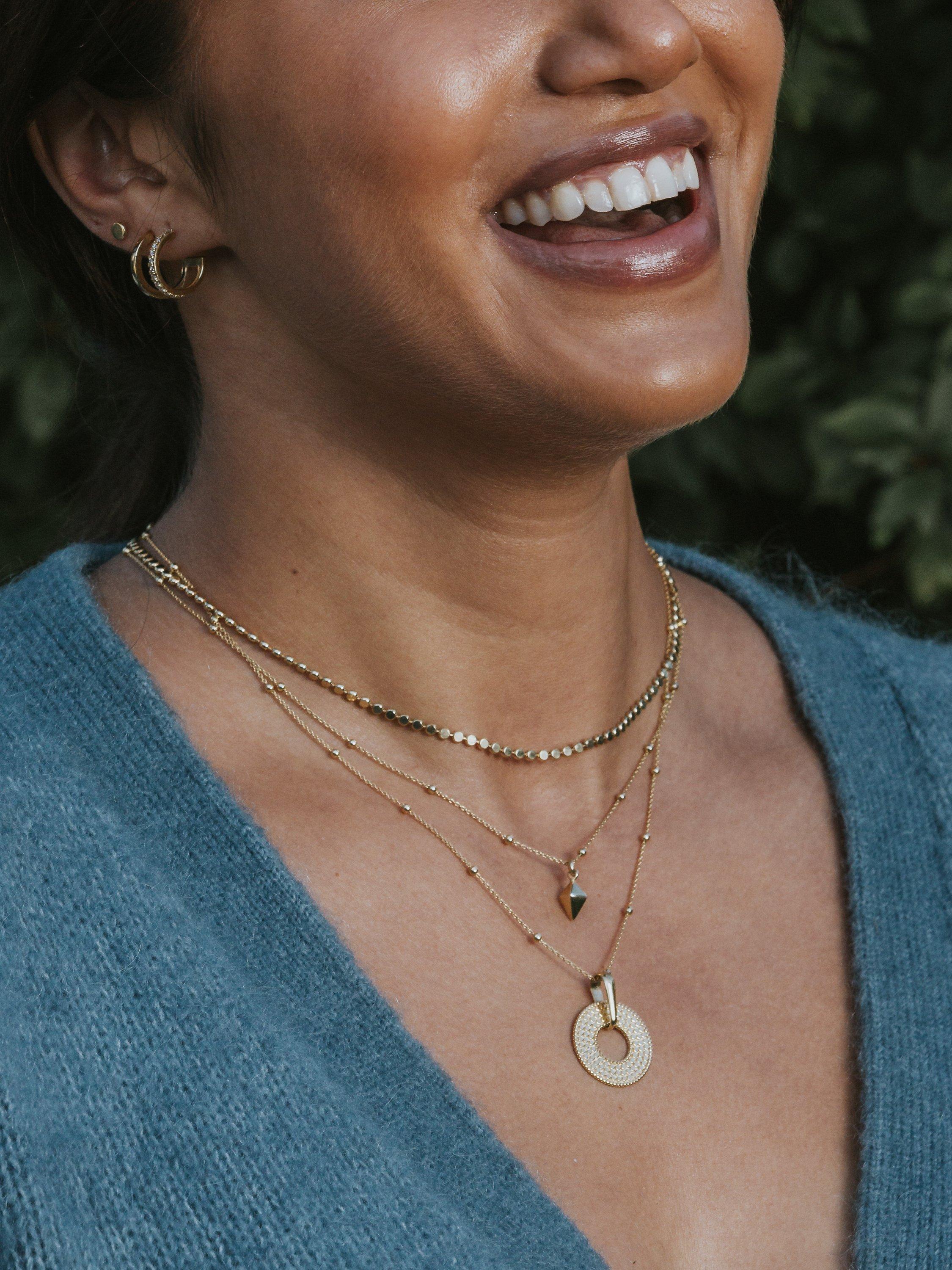Product image 2 of 3, which shows LARNAUTI Beaded Open Disc Pendant Necklace, Gold