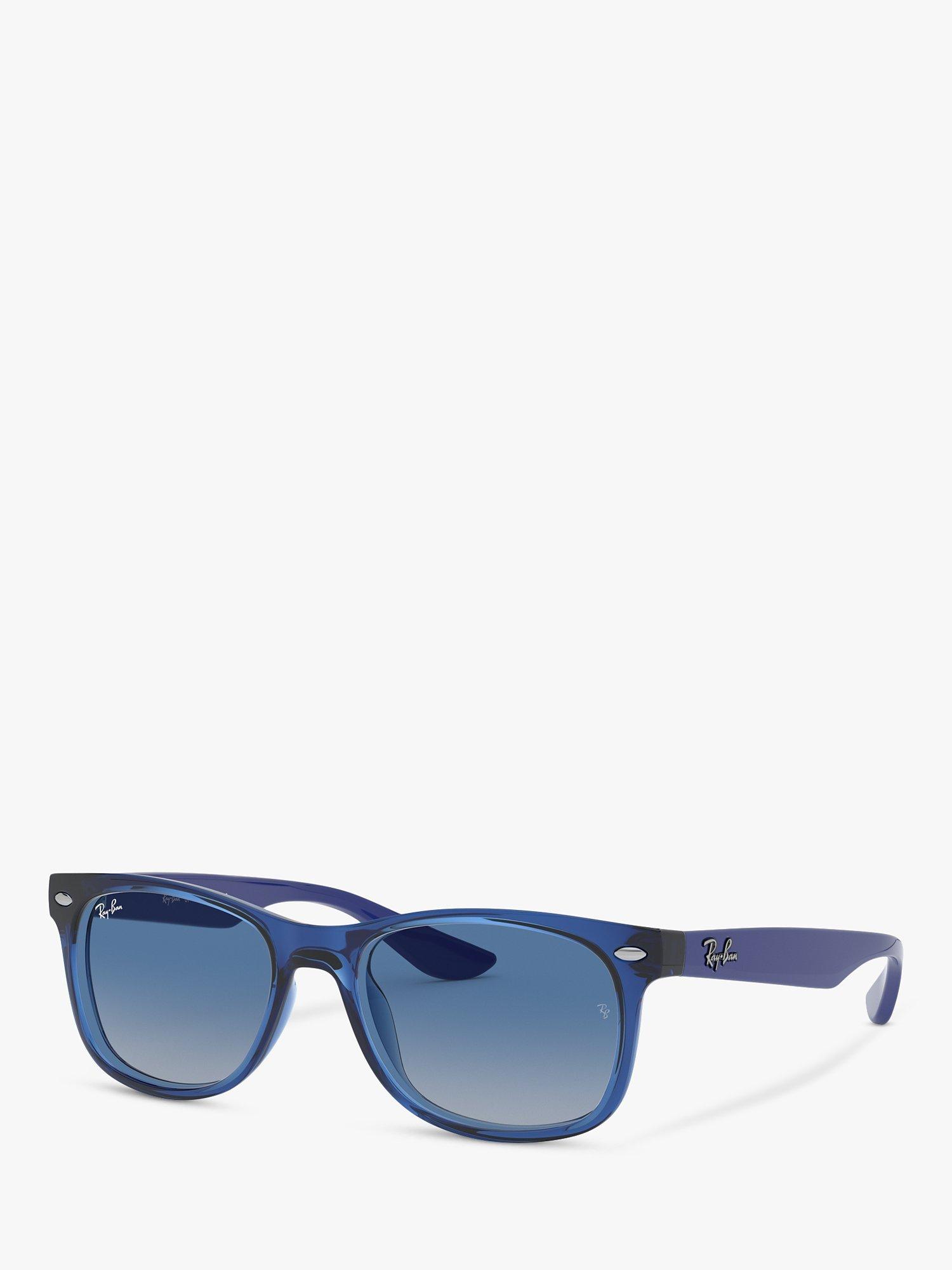 Product image 1 of 11, which shows Ray-Ban Junior RJ9052S Unisex New Wayfarer Sunglasses, Transparent Blue/Blue Gradient