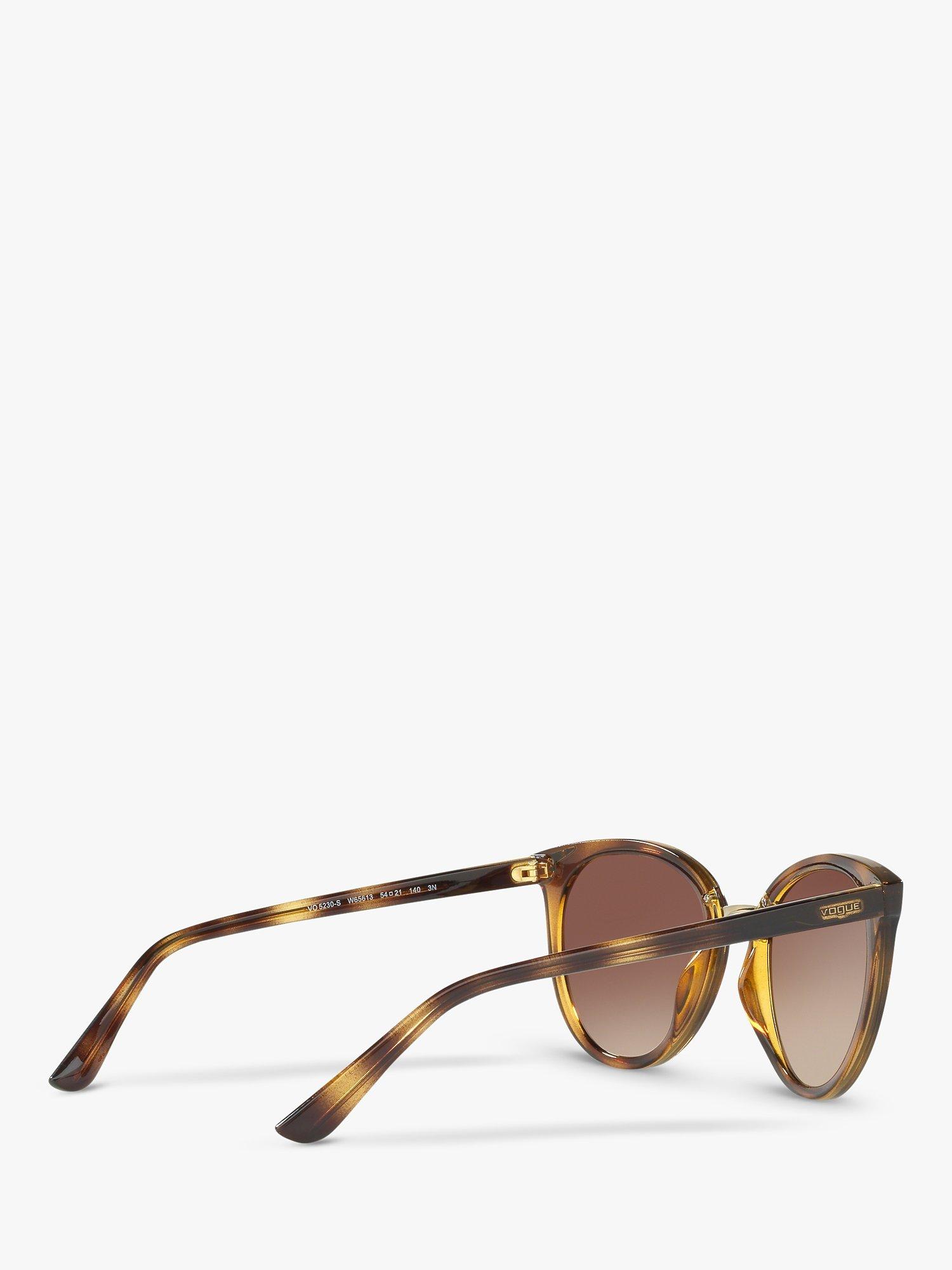 Product image 9 of 11, which shows Vogue VO5230S Women's Butterfly Sunglasses, Havana/Brown Gradient