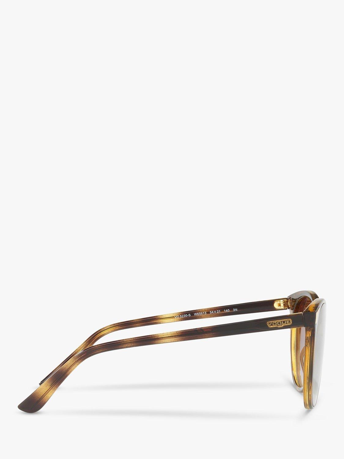 Product image 10 of 11, which shows Vogue VO5230S Women's Butterfly Sunglasses, Havana/Brown Gradient