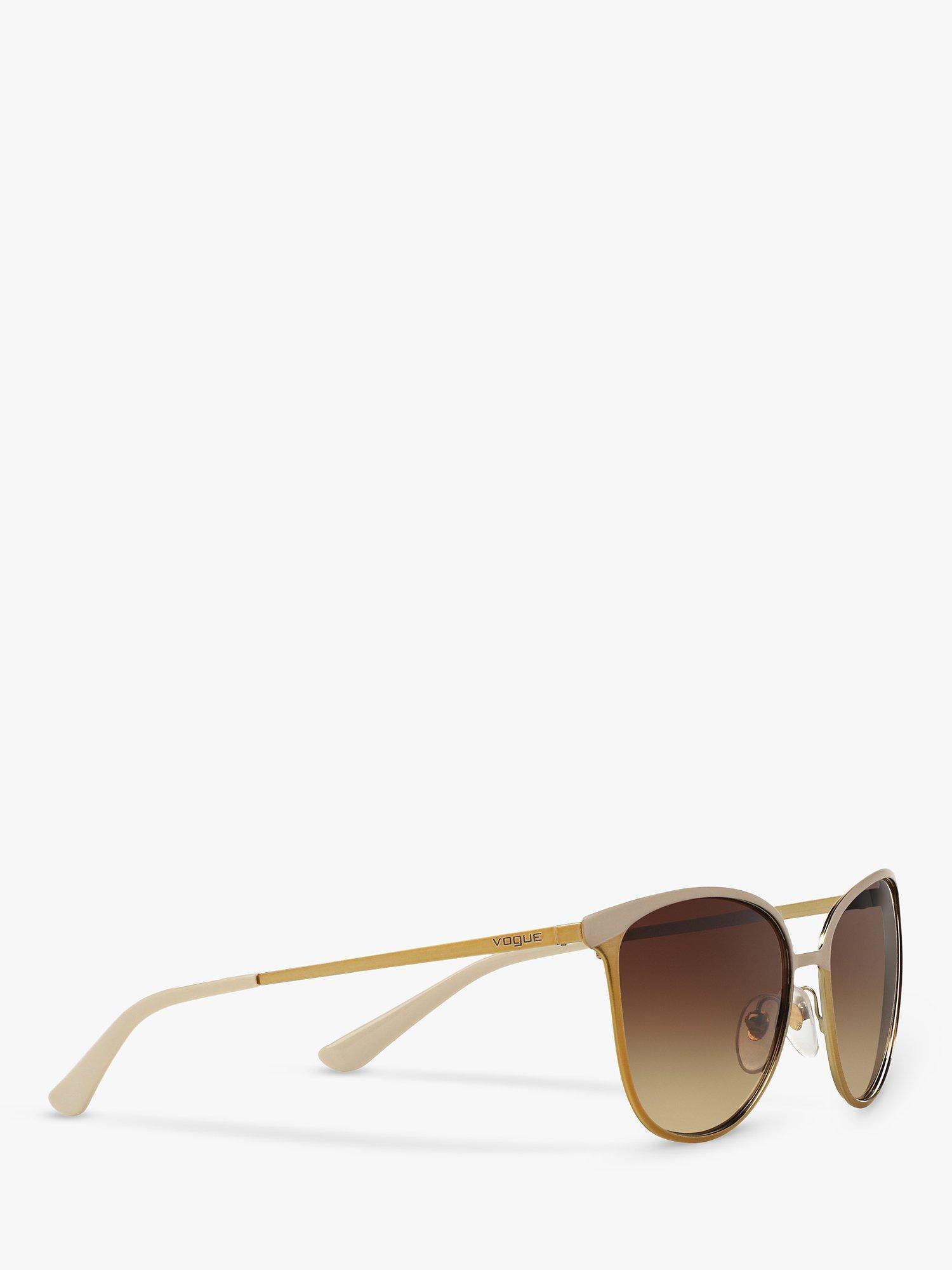Product image 11 of 11, which shows Vogue VO4002S Women's Oval Sunglasses, Brushed Gold/Brown Gradient