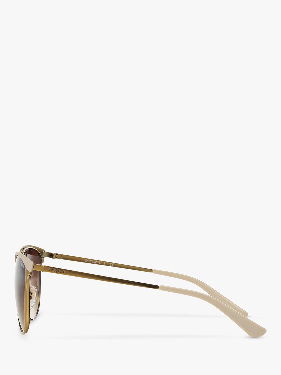 Product image 4 of 11, which shows Vogue VO4002S Women's Oval Sunglasses, Brushed Gold/Brown Gradient