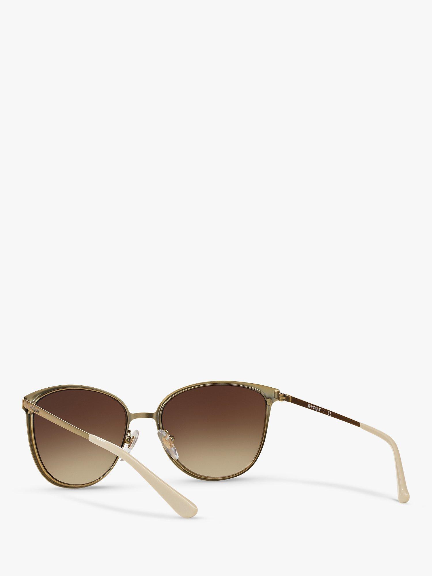 Product image 6 of 11, which shows Vogue VO4002S Women's Oval Sunglasses, Brushed Gold/Brown Gradient