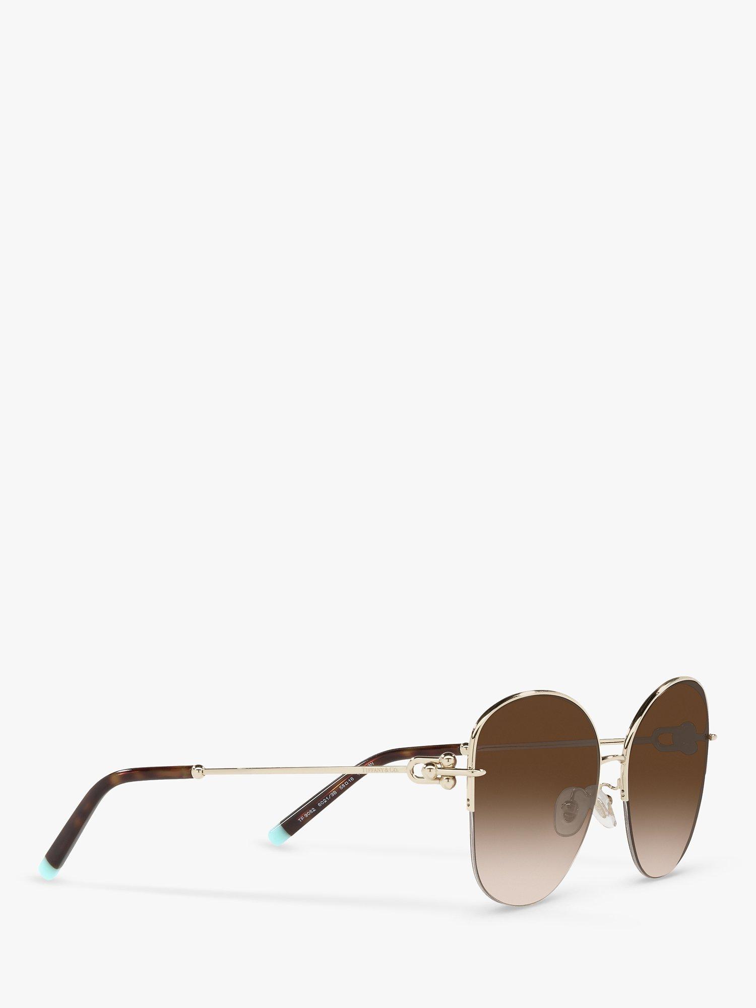 Product image 11 of 11, which shows Tiffany & Co TF3082 Women's Pillow Shape Sunglasses, Pale Gold/Brown Gradient