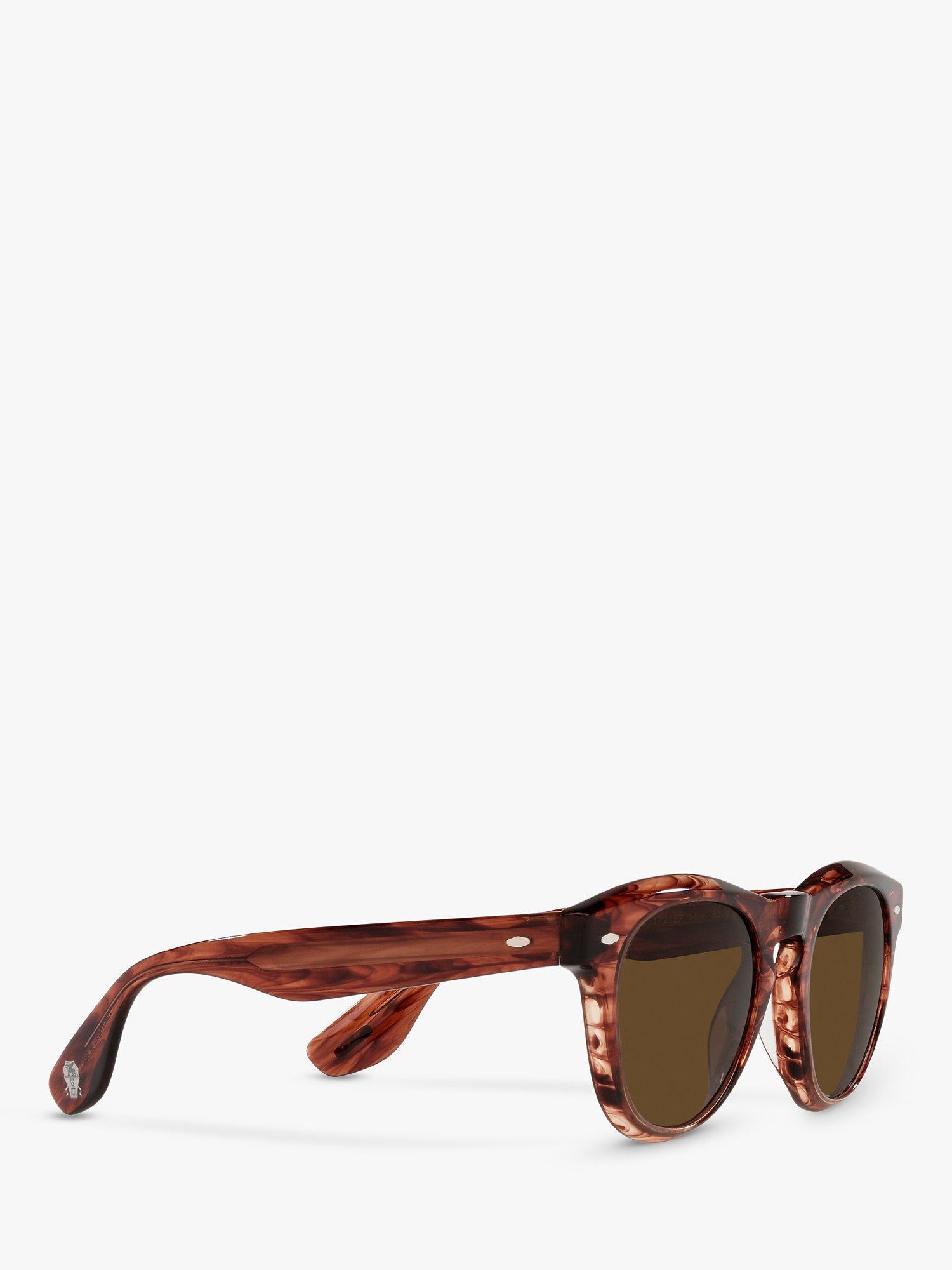 Product image 11 of 11, which shows Oliver Peoples OV5473SU Unisex Nino Polarised Oval Sunglasses, Dark Amber Smoke/Brown
