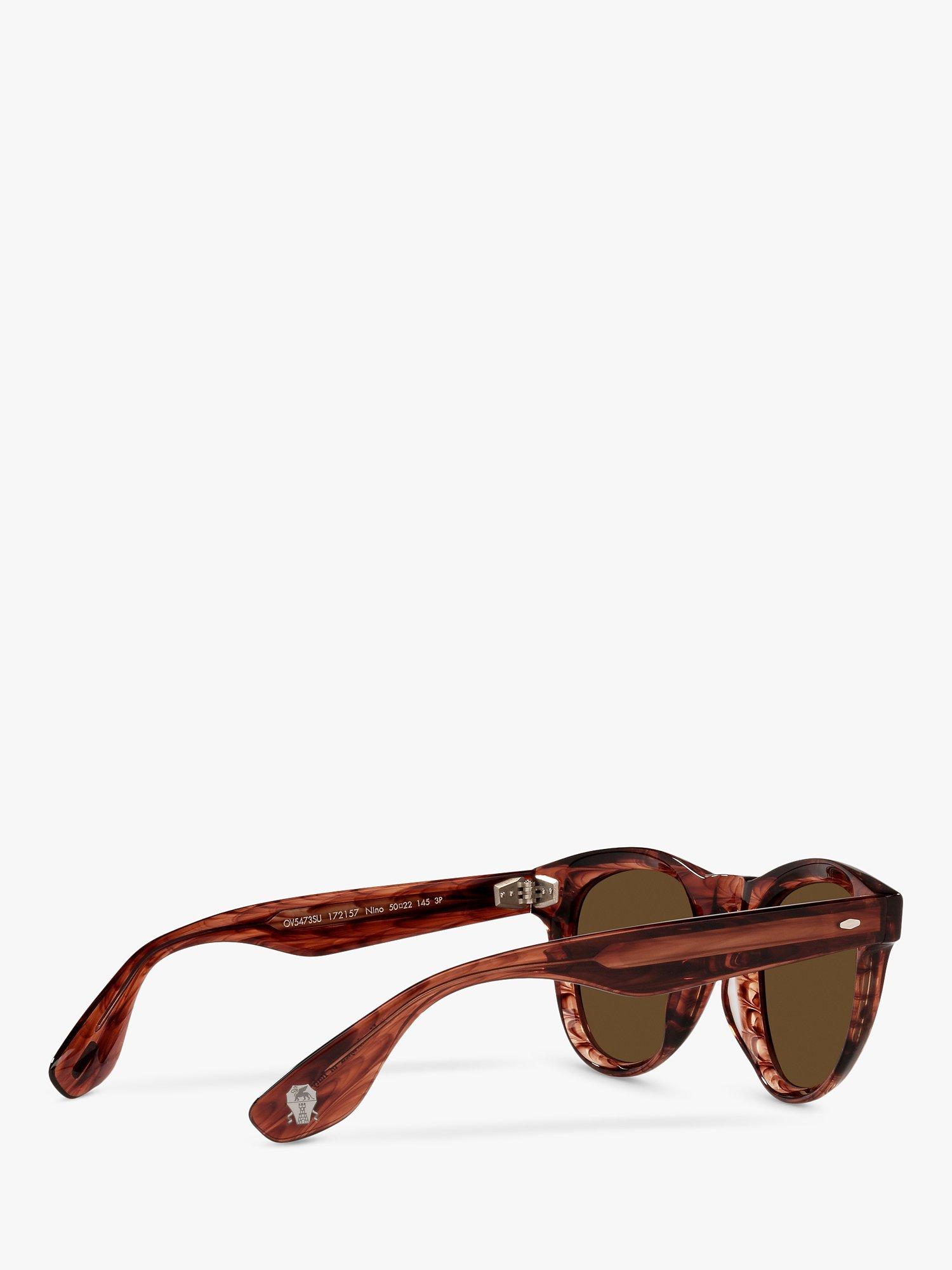Product image 9 of 11, which shows Oliver Peoples OV5473SU Unisex Nino Polarised Oval Sunglasses, Dark Amber Smoke/Brown