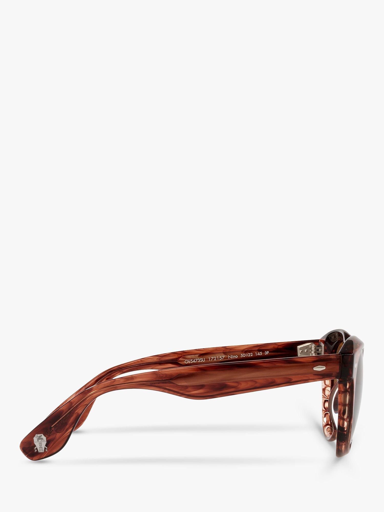 Product image 10 of 11, which shows Oliver Peoples OV5473SU Unisex Nino Polarised Oval Sunglasses, Dark Amber Smoke/Brown