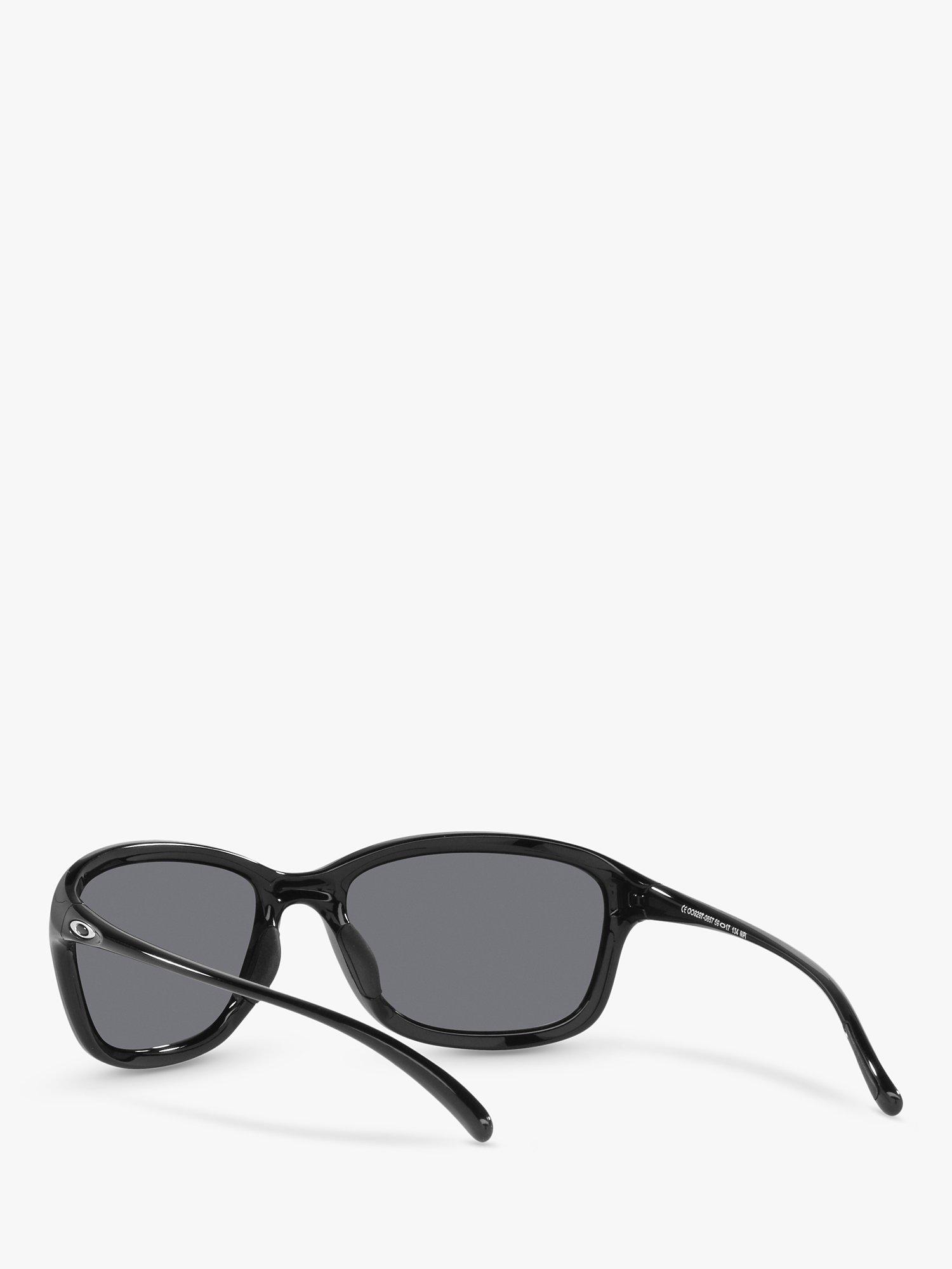 Oakley OO9297 Women's She's Unstoppable Polarised Oval Sunglasses, Polished Black/Mirror Grey