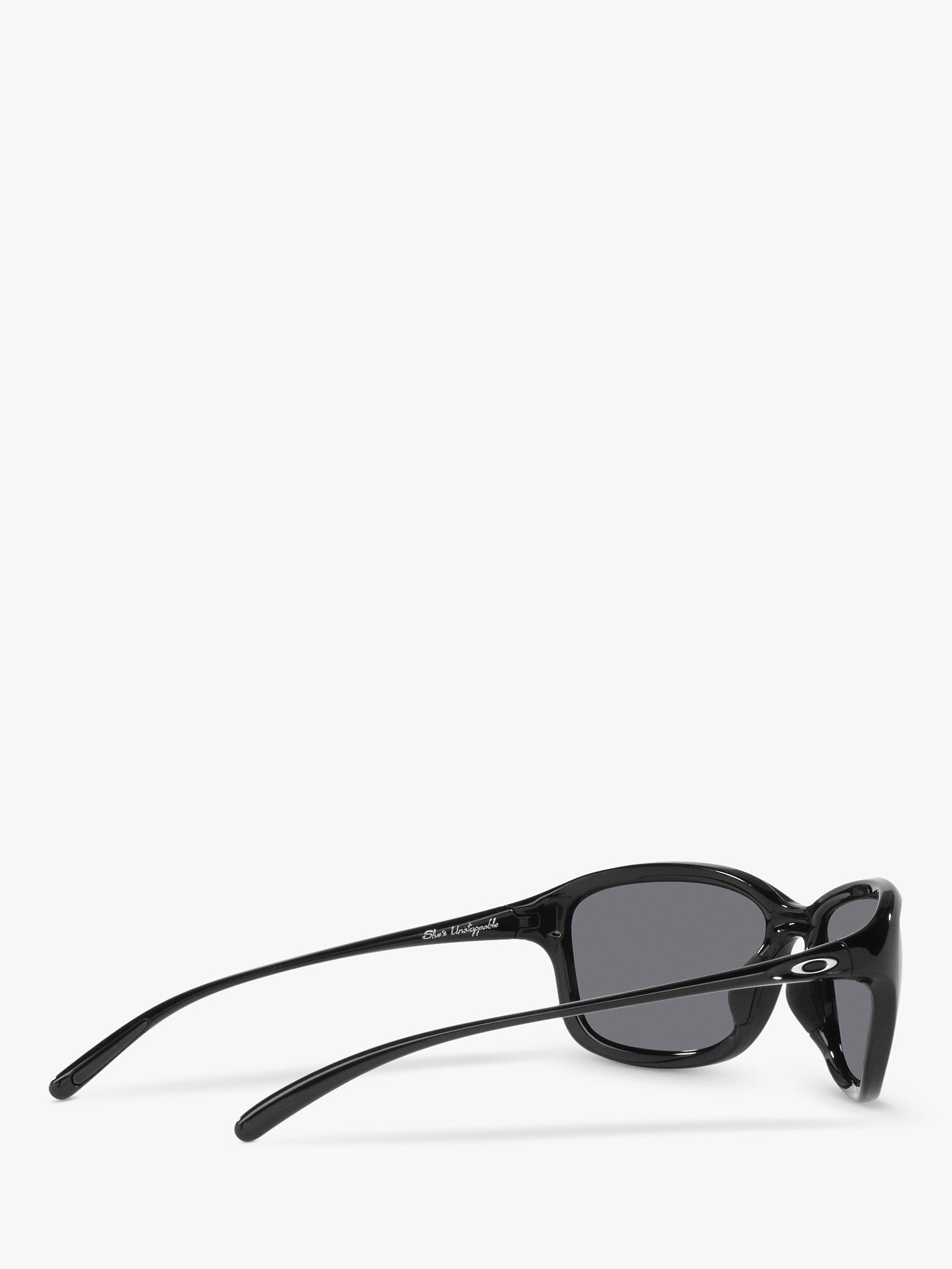 Oakley OO9297 Women's She's Unstoppable Polarised Oval Sunglasses, Polished Black/Mirror Grey