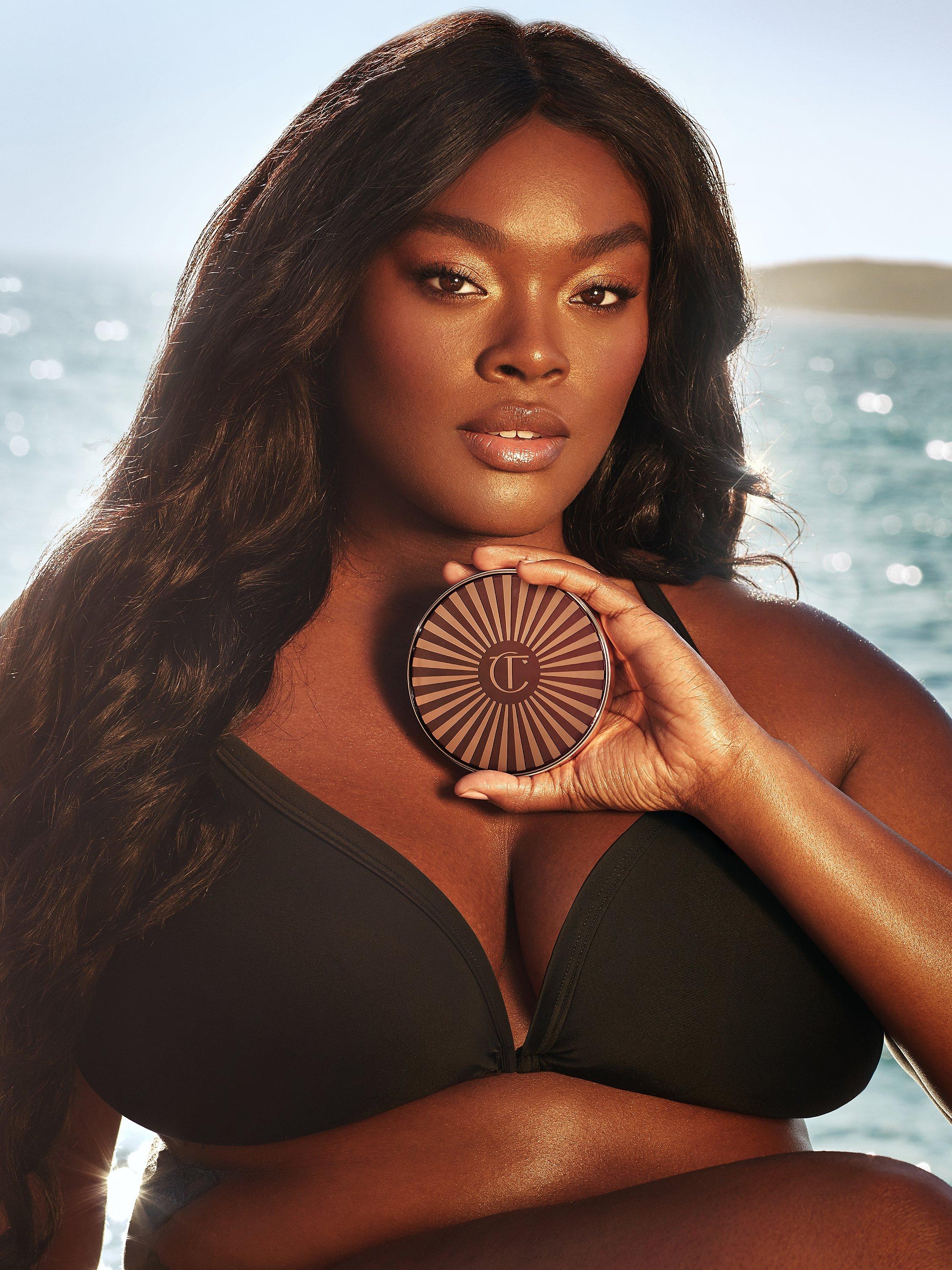 Product image 2 of 9, which shows Charlotte Tilbury Beautiful Skin Sun-Kissed Glow Bronzer, 4 Deep