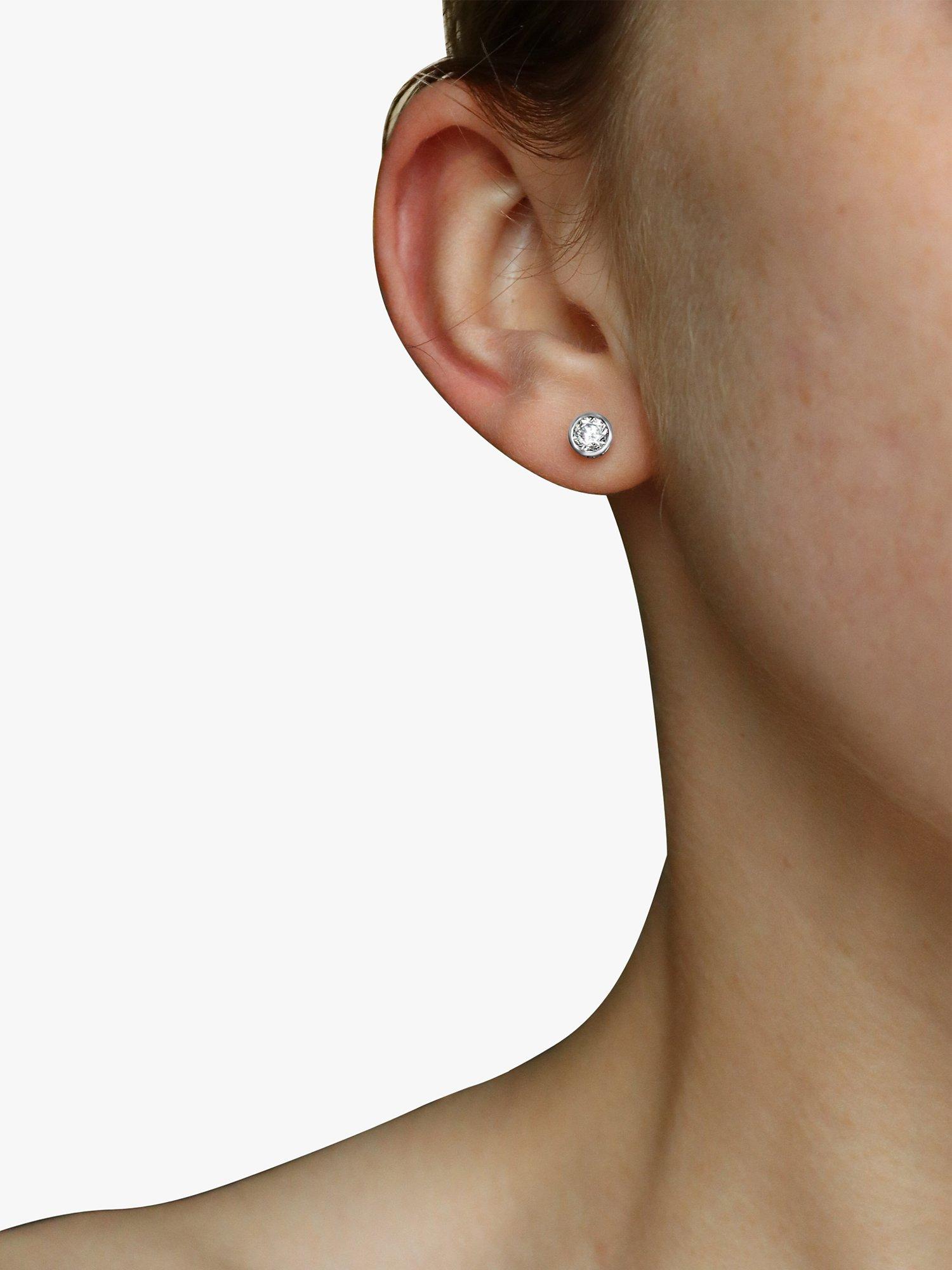 Product image 1 of 3, which shows Milton & Humble Jewellery Pre-Loved 18ct White Gold Single Diamond Stud Earrings