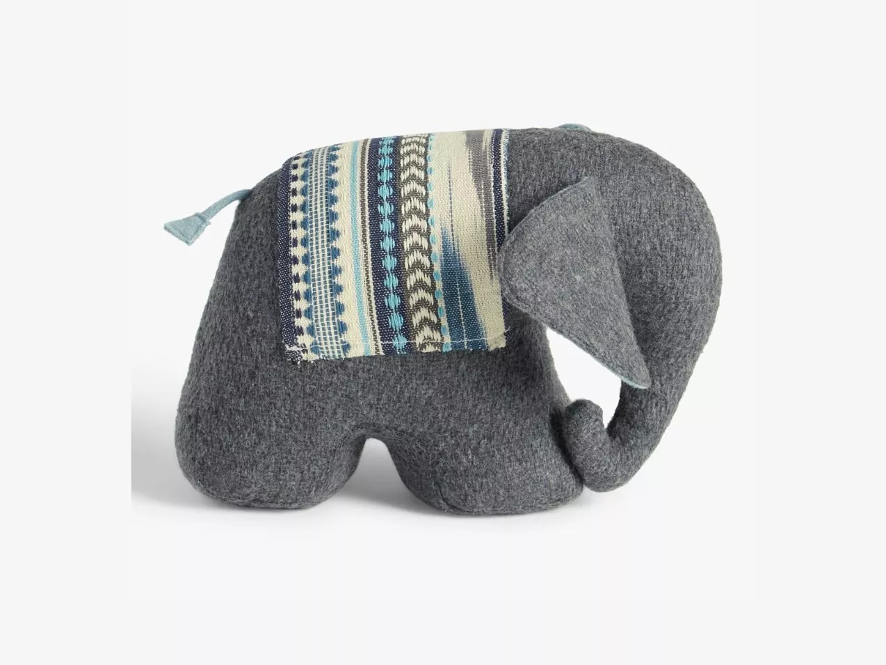 Grey felt elephant doorstop with blue patterned blanket, soft fabric decor weight on white background
