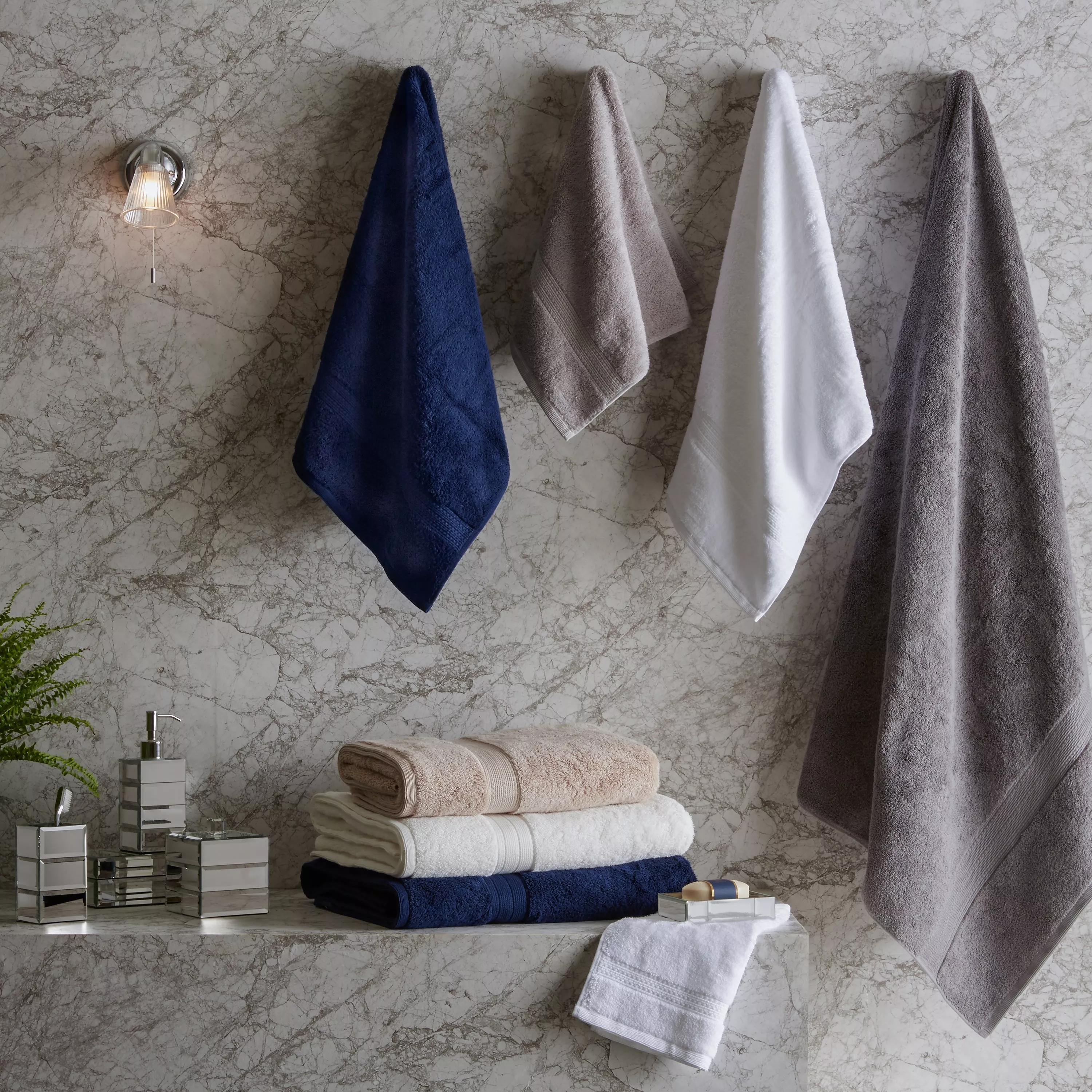 Christmas tree in a living room with armchair and sofa