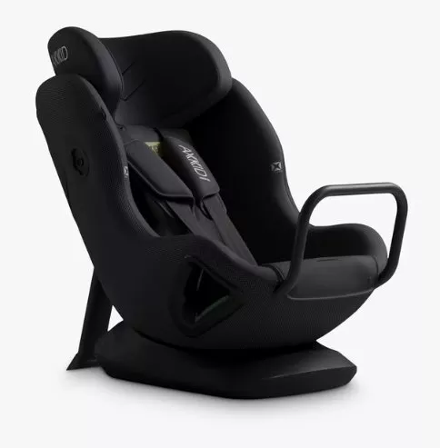 Black child car seat with harness and side impact protection, shown on base with safety handle bar