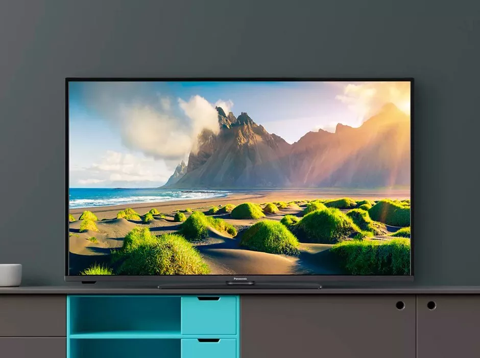 TV with mountain scene on the screen