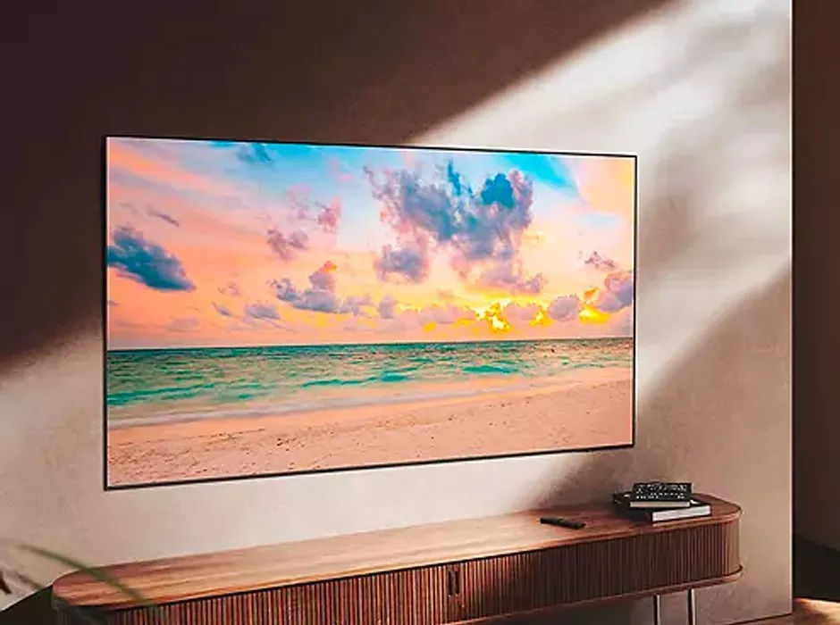 TV screen with beach sunset image on it