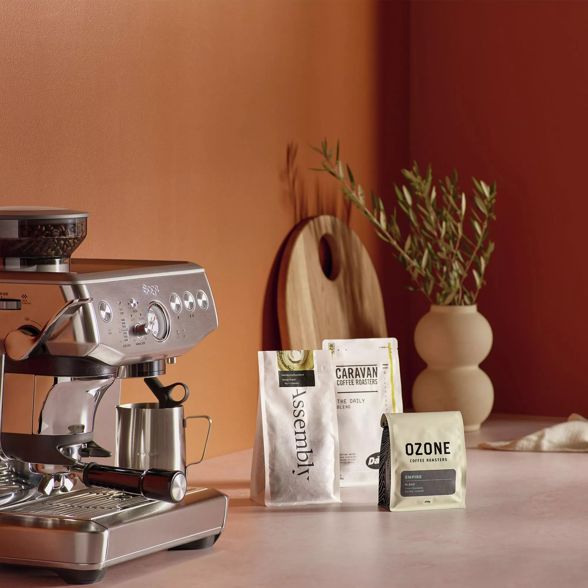 Coffee beans selection next to a coffee machine