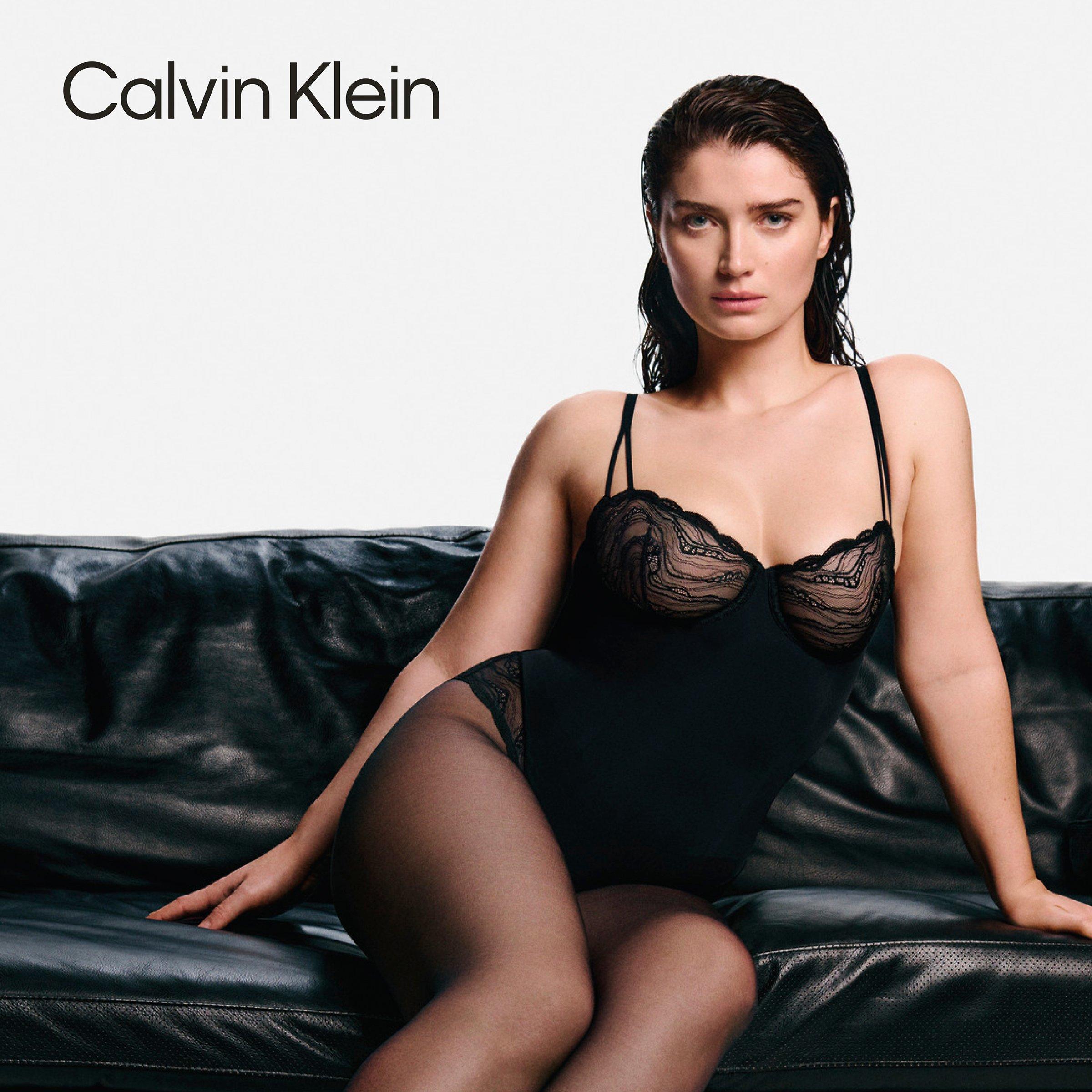 actress Eve Hewson wearing black lacy shapewear