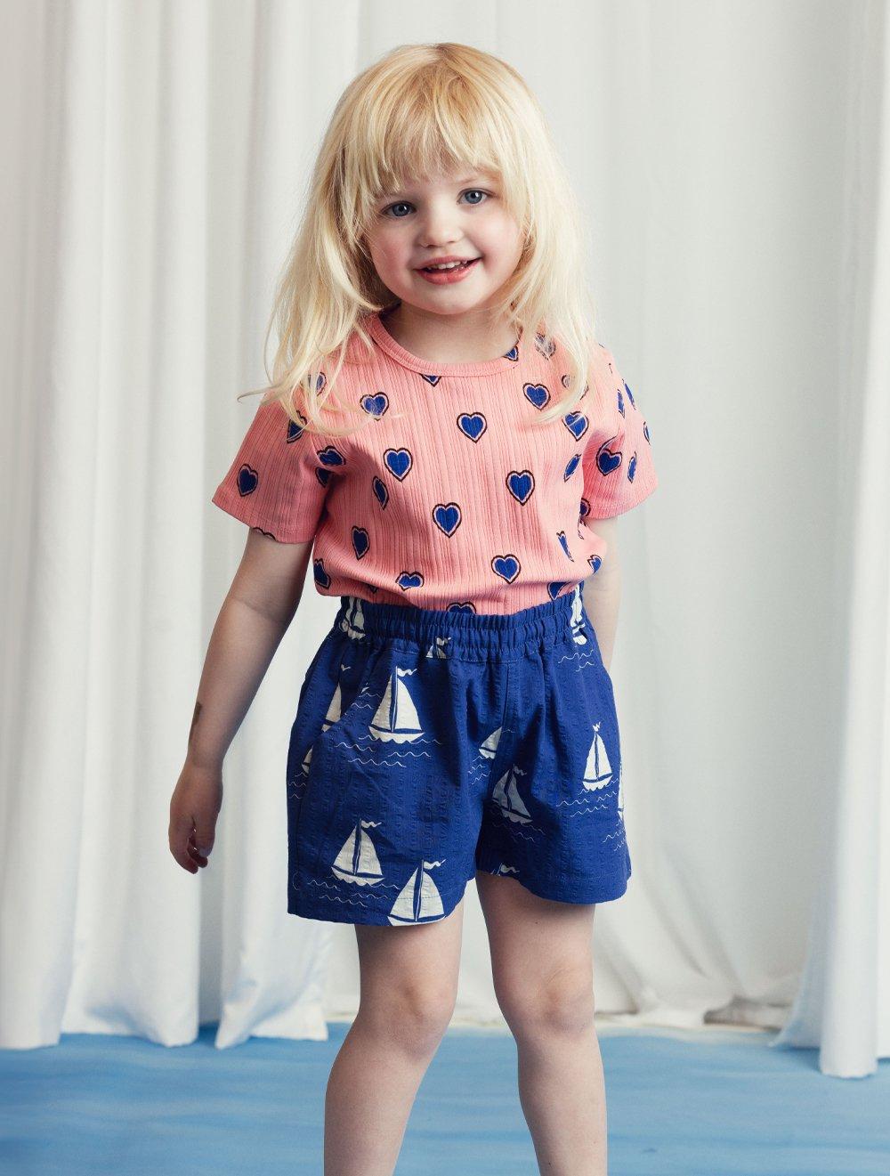girl wearing clothes from Mini Rodini
