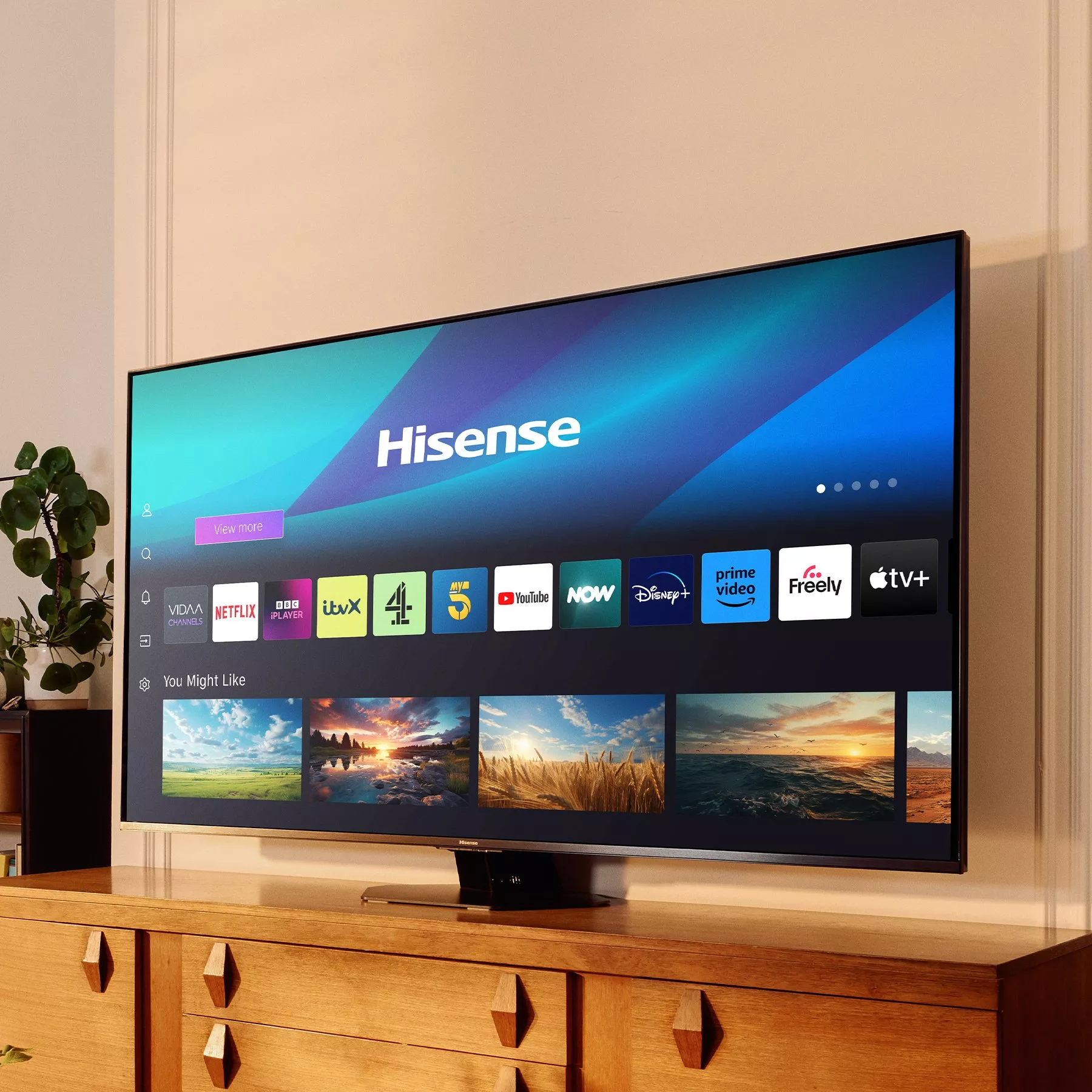 A modern Hisense smart TV on a wooden stand displaying various streaming apps. "Which? Best Buy" badge visible.