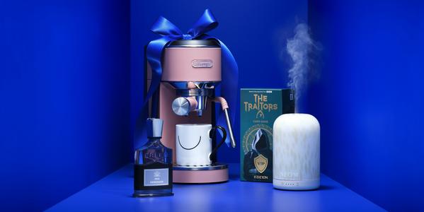 Delonghi espresso machine with ribbon gift bow, Creed aftershave, Traitors card game and NEOM diffuser set