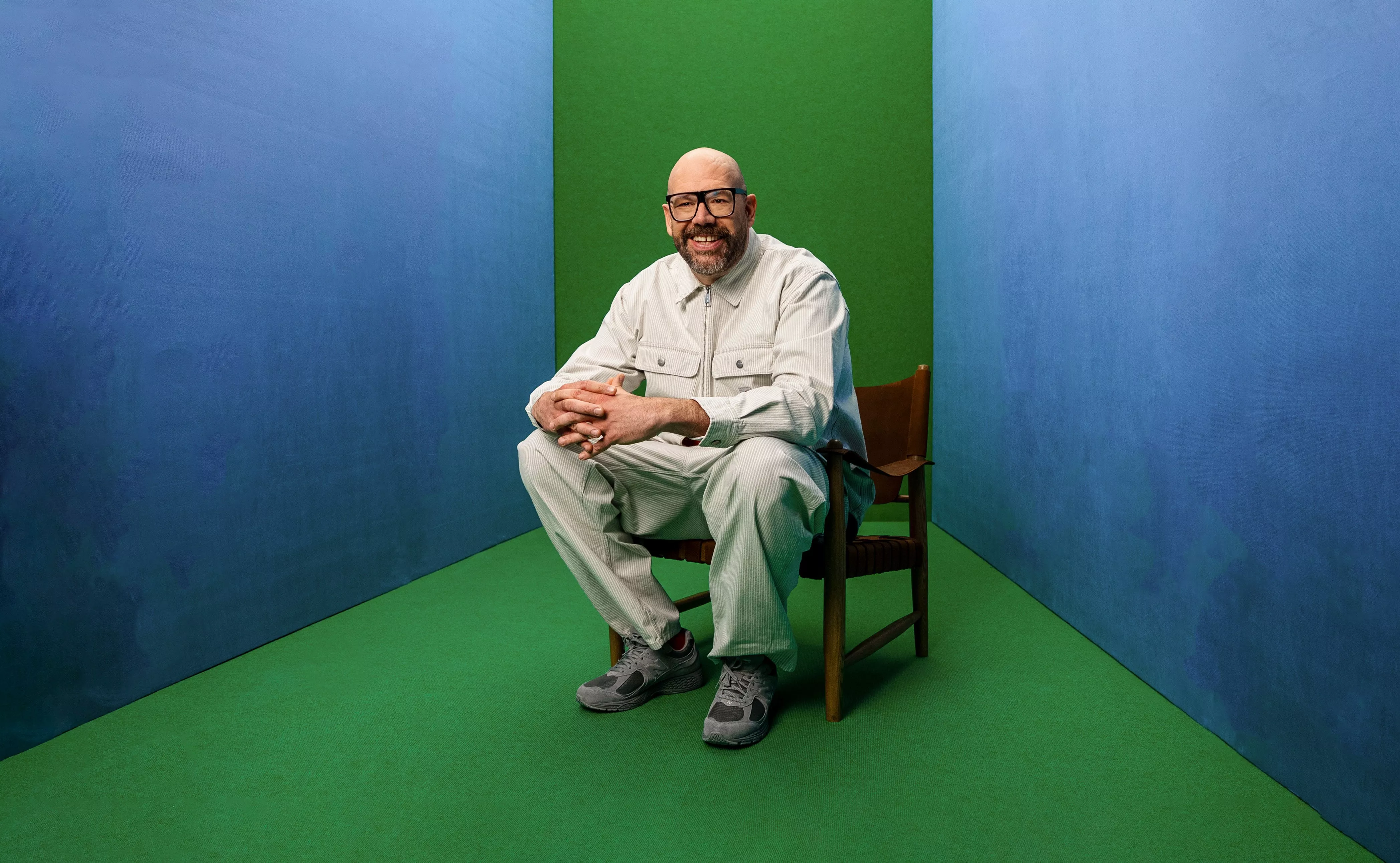 photo of tom davis in a green an blue room