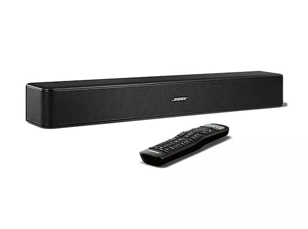 A sleek black Bose soundbar with a matching remote control placed in front, set against a white background.