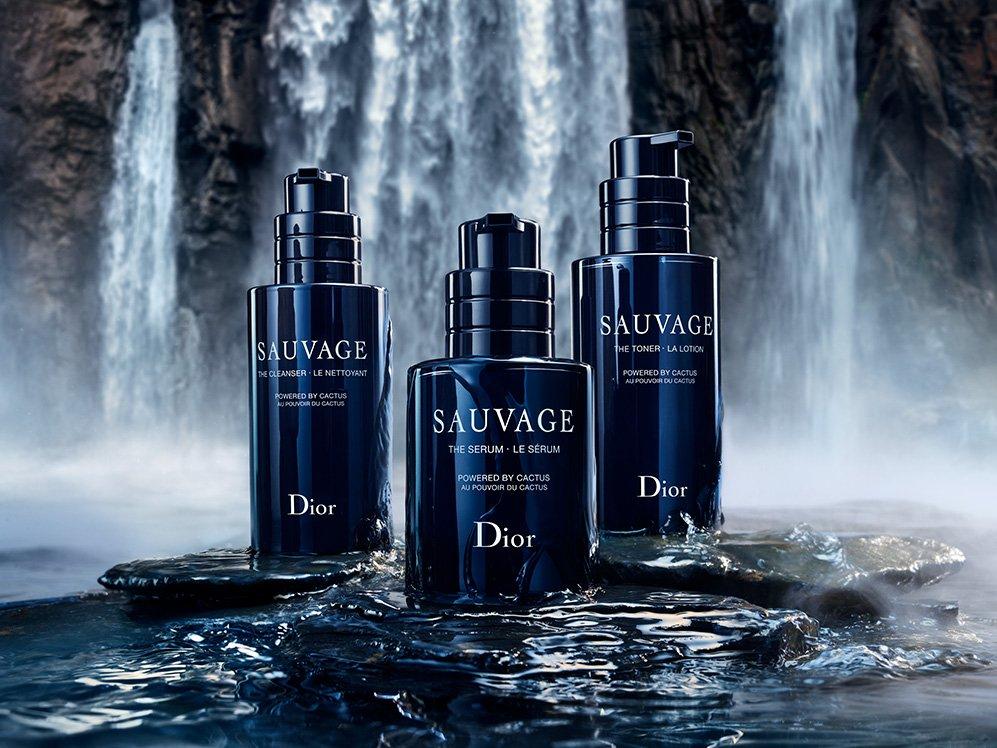 product shot of sauvage grroming products in front of a waterfall