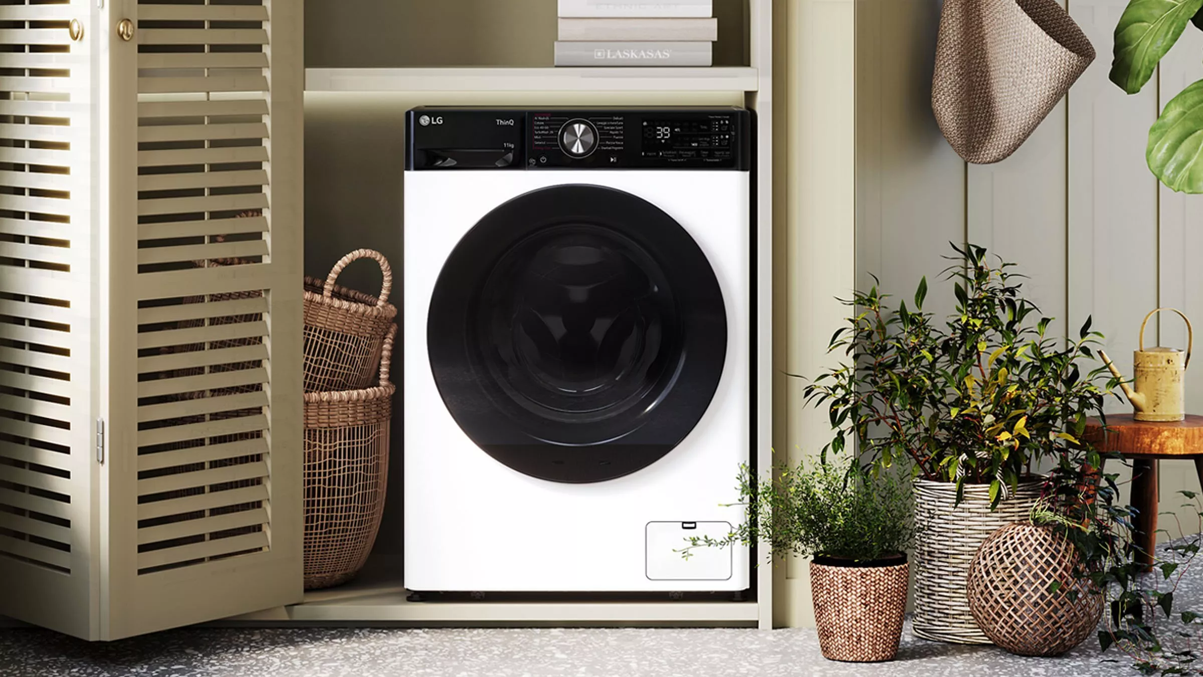 Modern LG front-loading washing machine in a built-in laundry cupboard with wicker baskets and indoor plants.